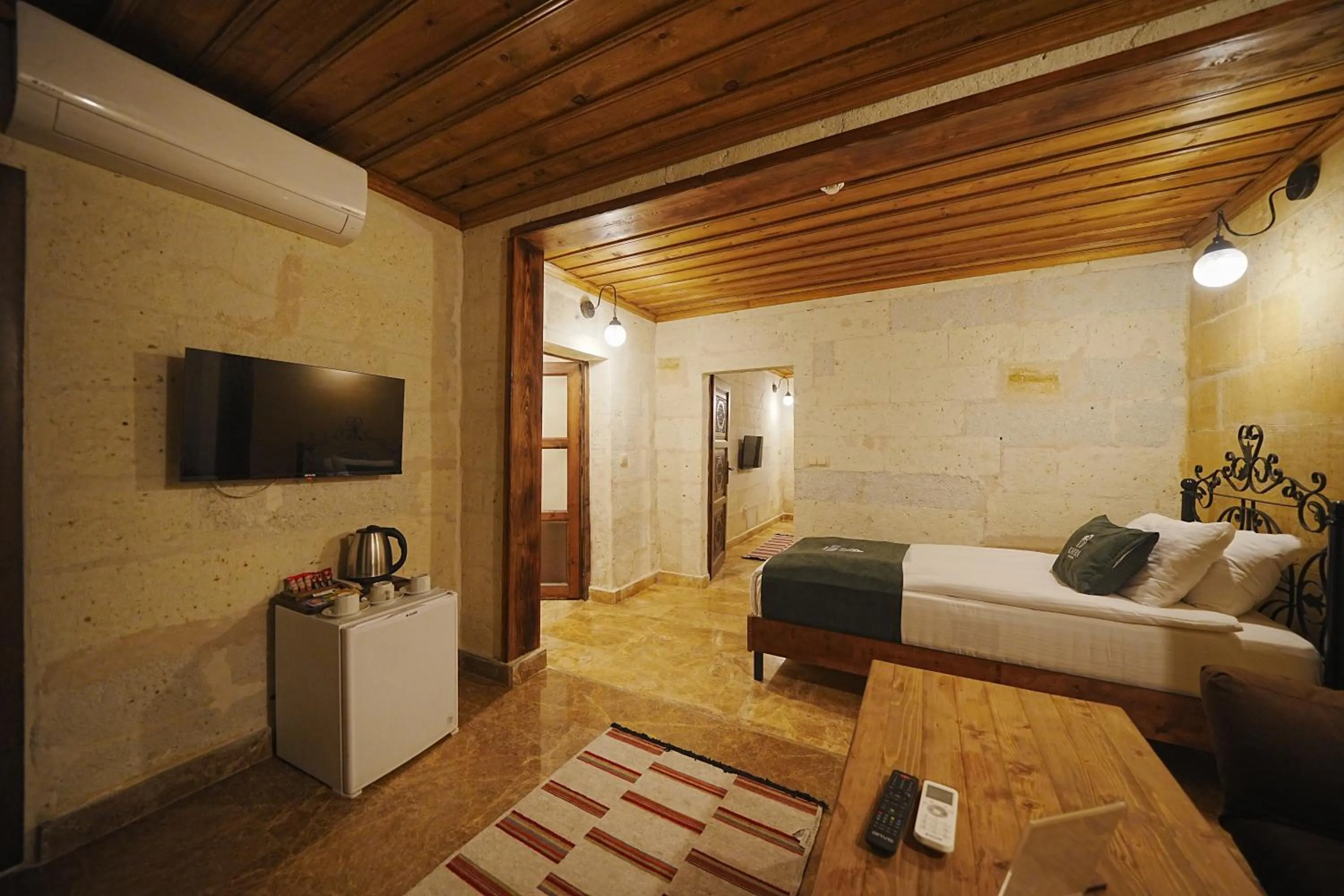 Bed in Kayra Cave Suites