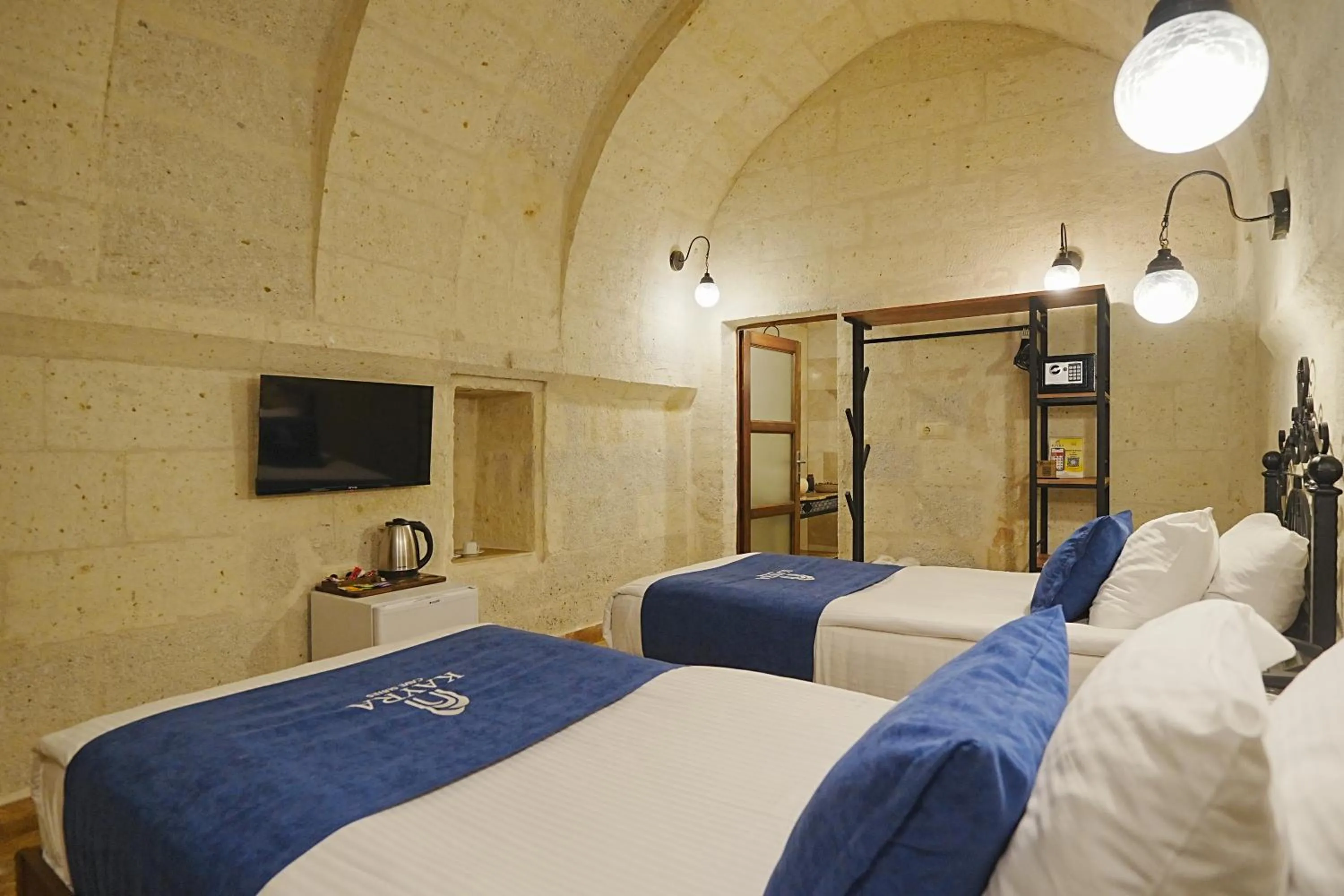 Bed in Kayra Cave Suites