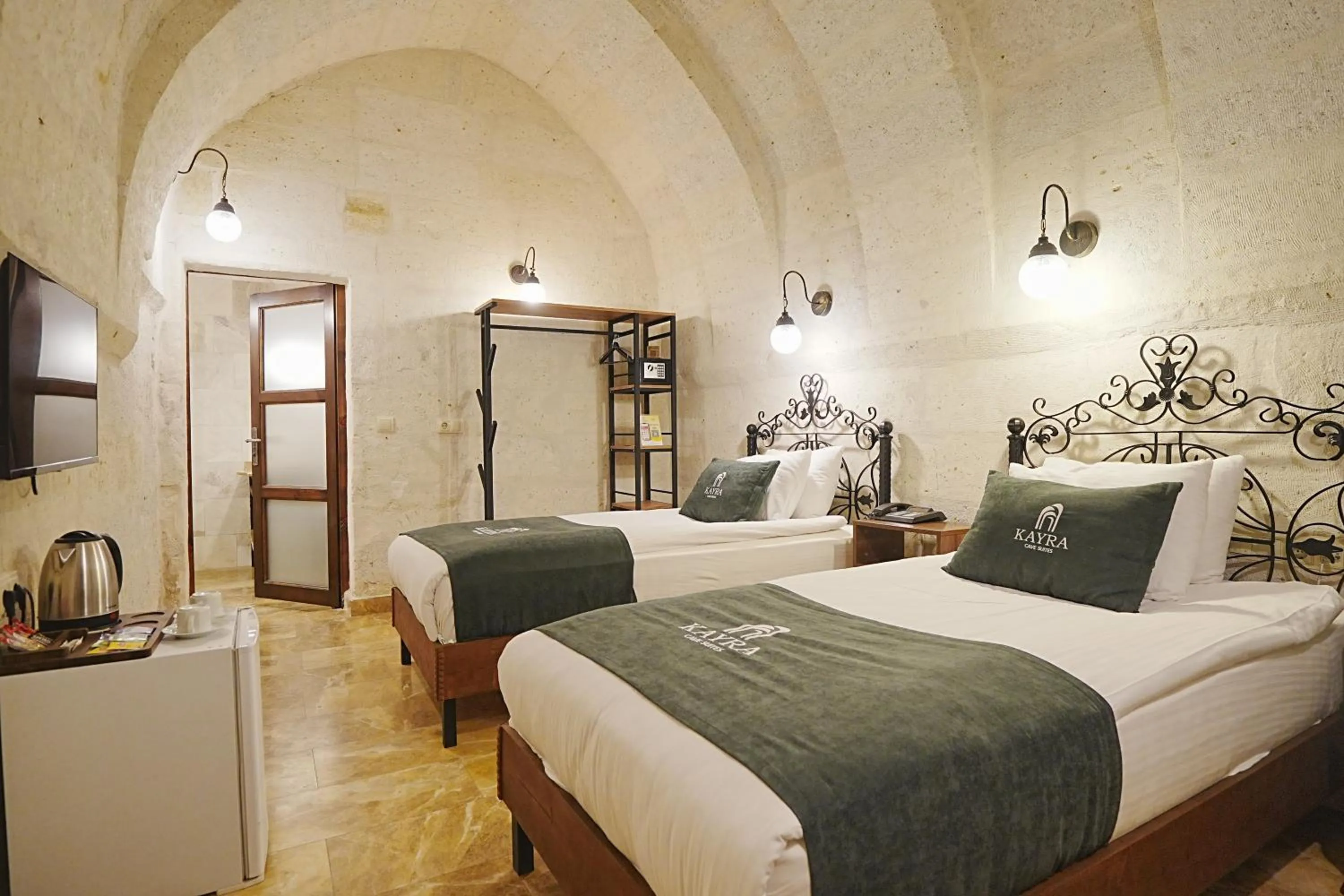 Bed in Kayra Cave Suites