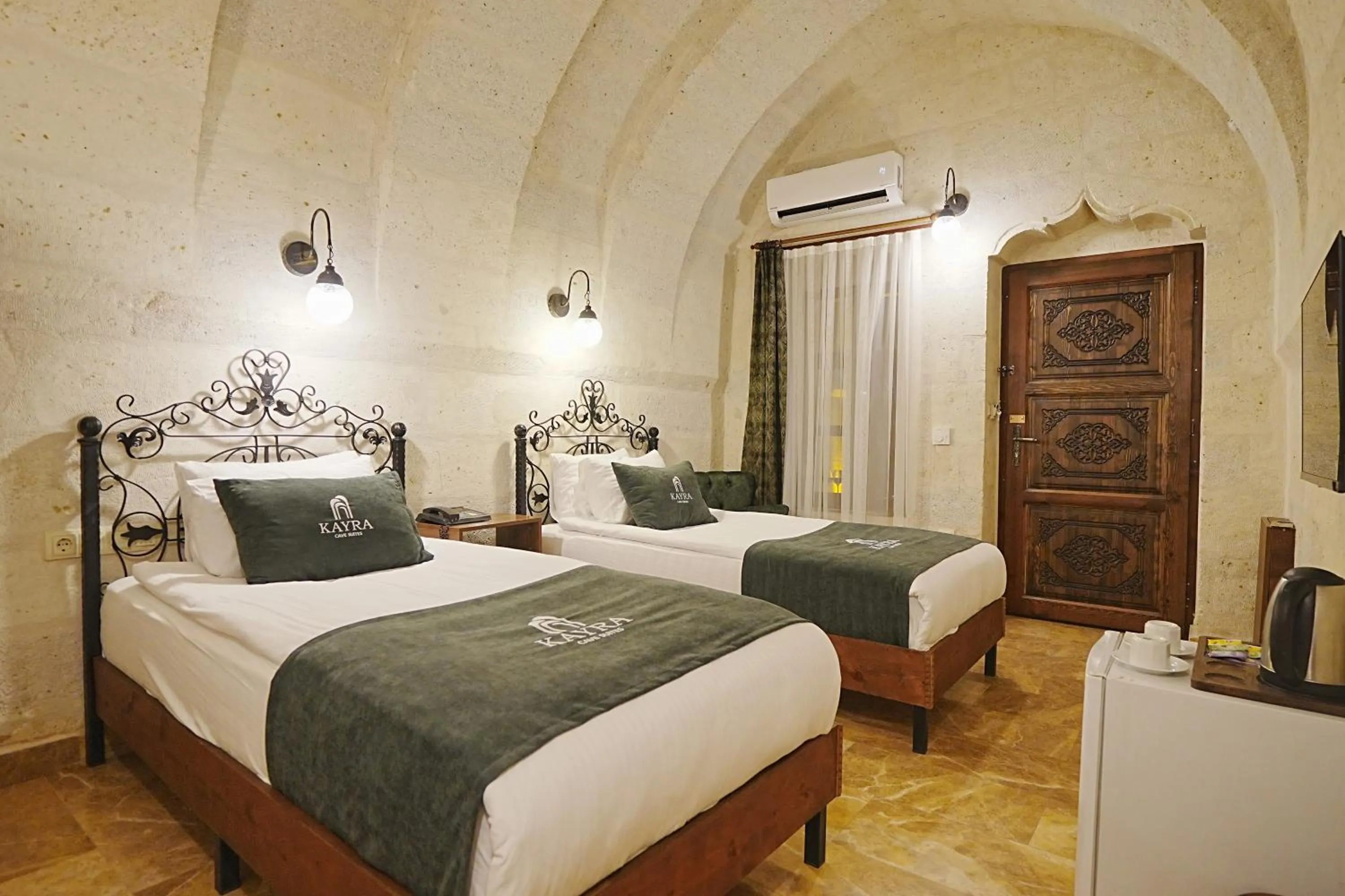 Bed in Kayra Cave Suites
