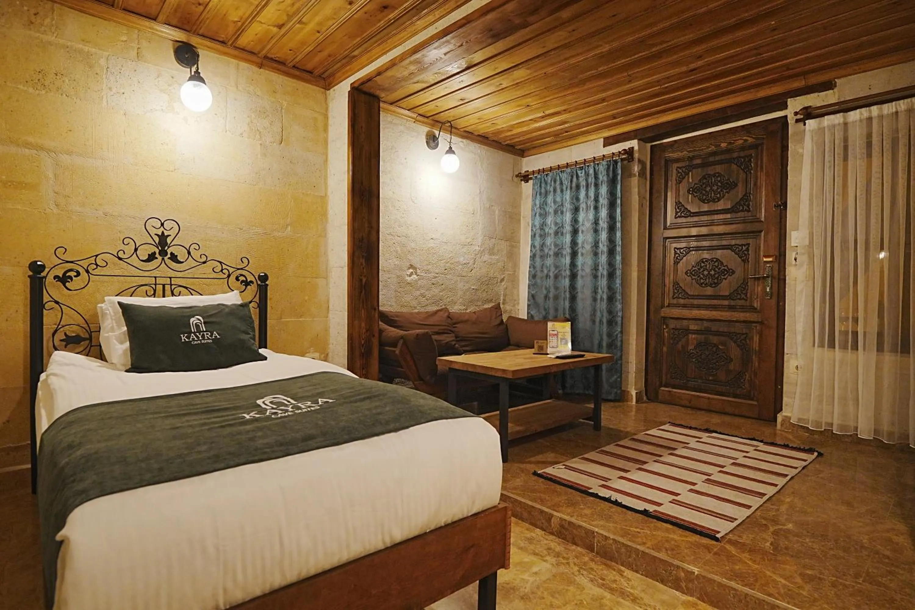 Bed in Kayra Cave Suites