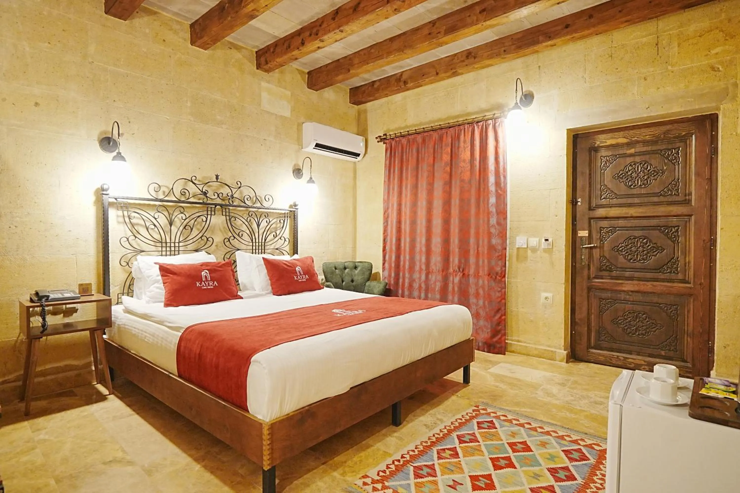 Bed in Kayra Cave Suites