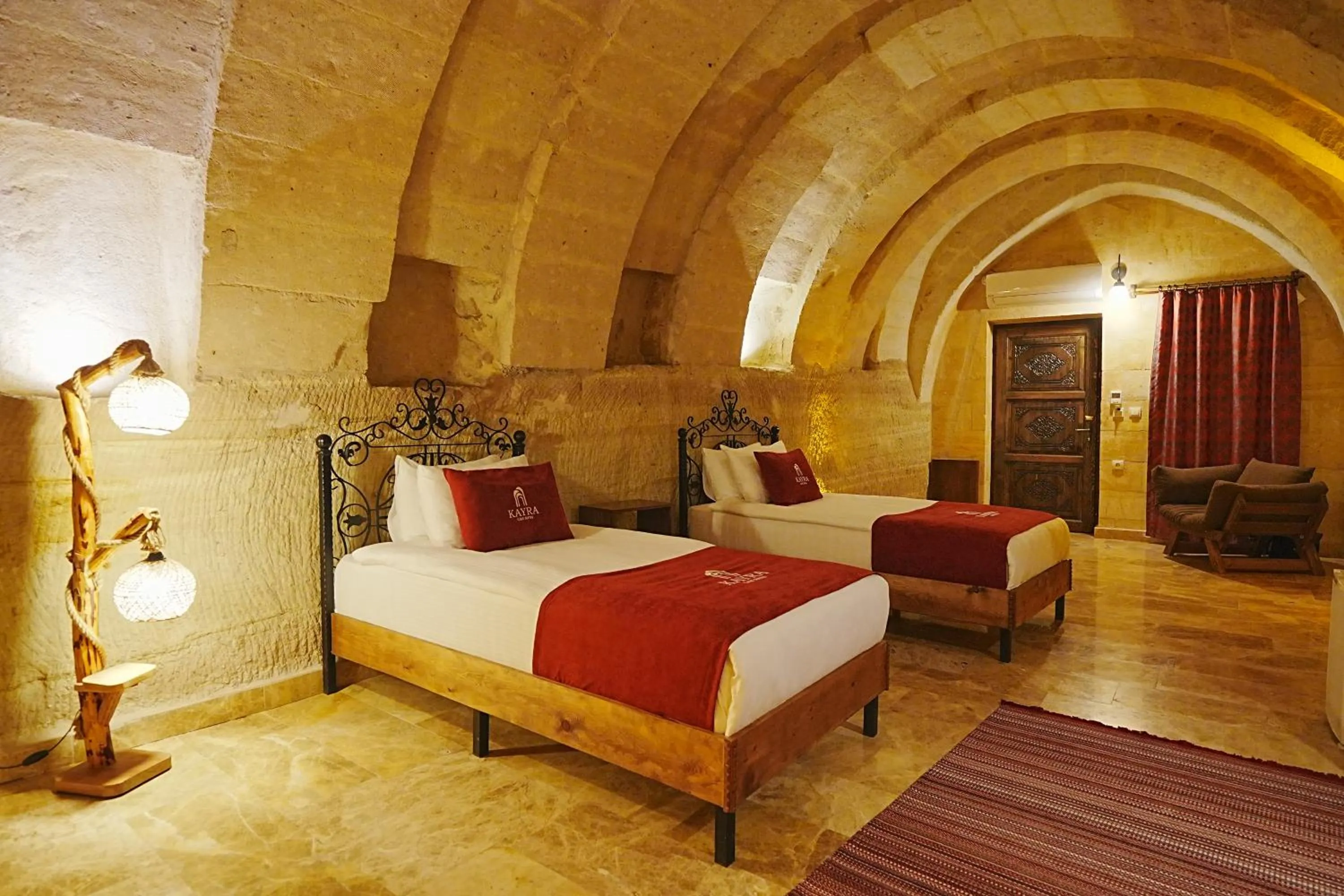 Bed in Kayra Cave Suites