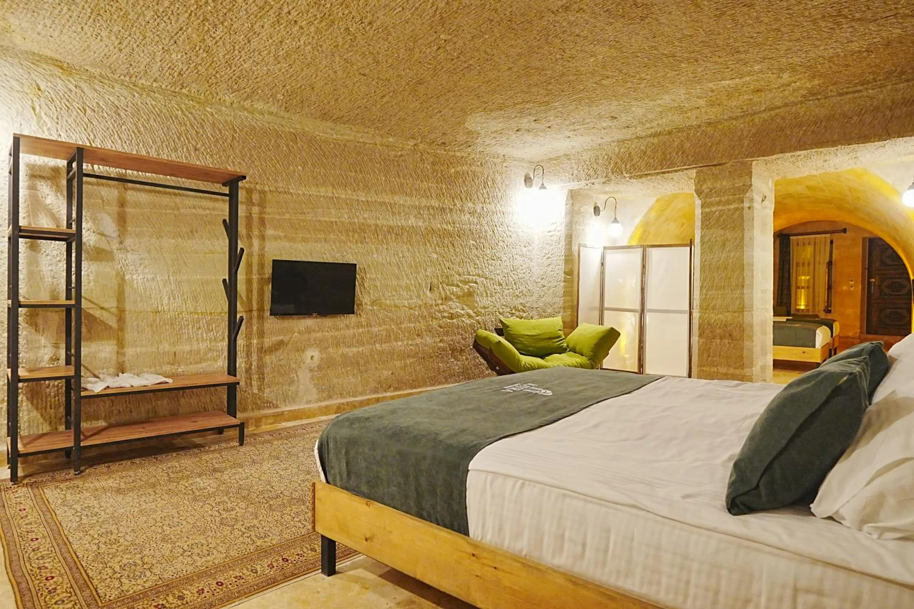 Bed in Kayra Cave Suites