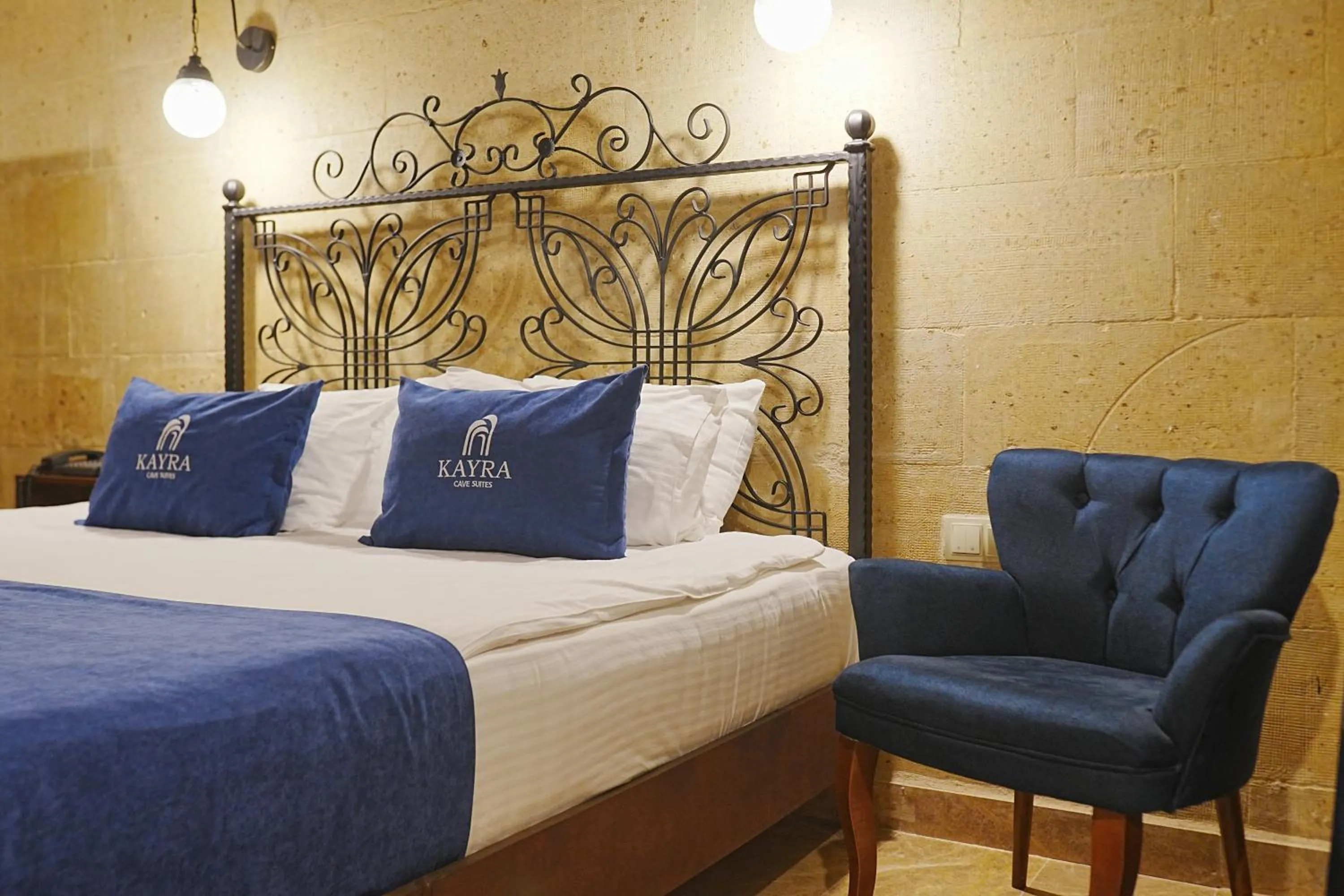 Bed in Kayra Cave Suites