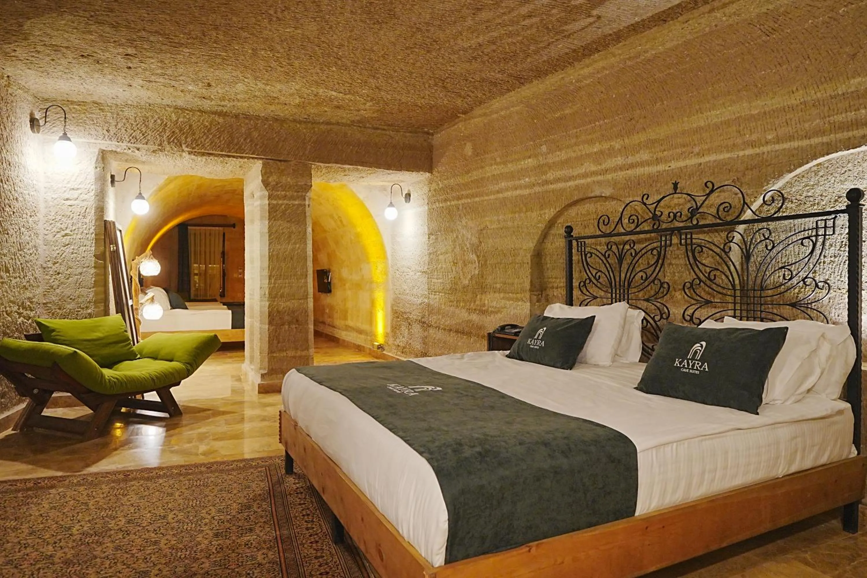 Bed in Kayra Cave Suites