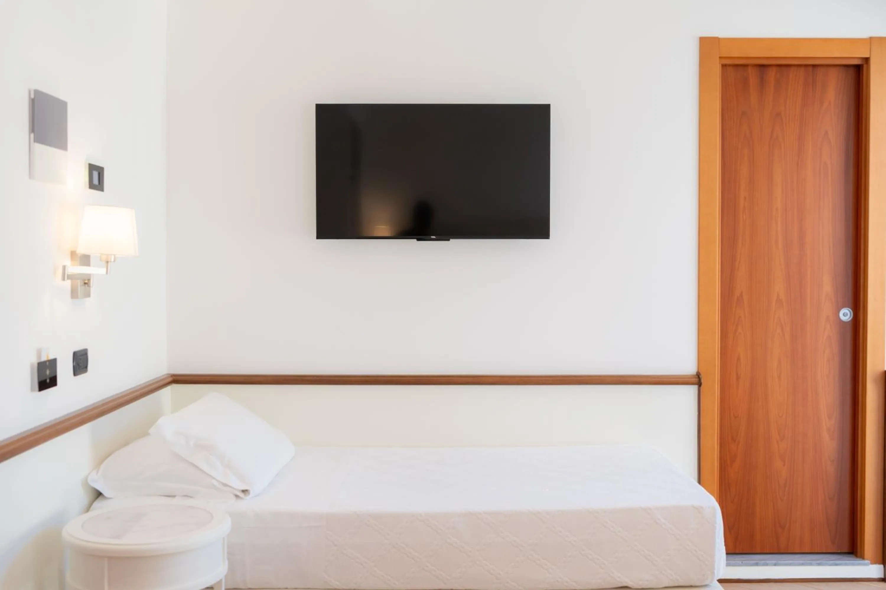 Bed in Hotel Florida Lerici