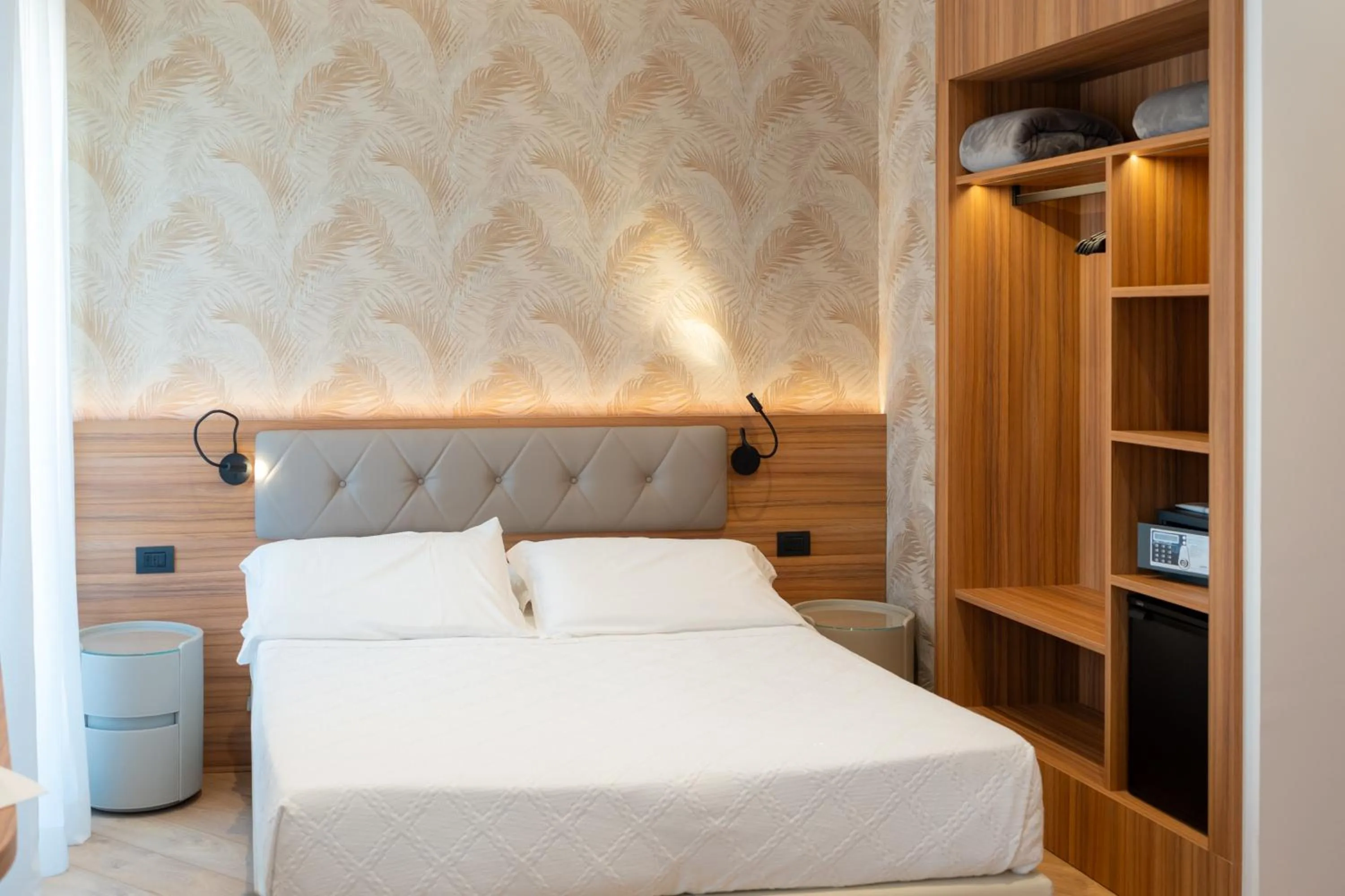 Bed in Hotel Florida Lerici