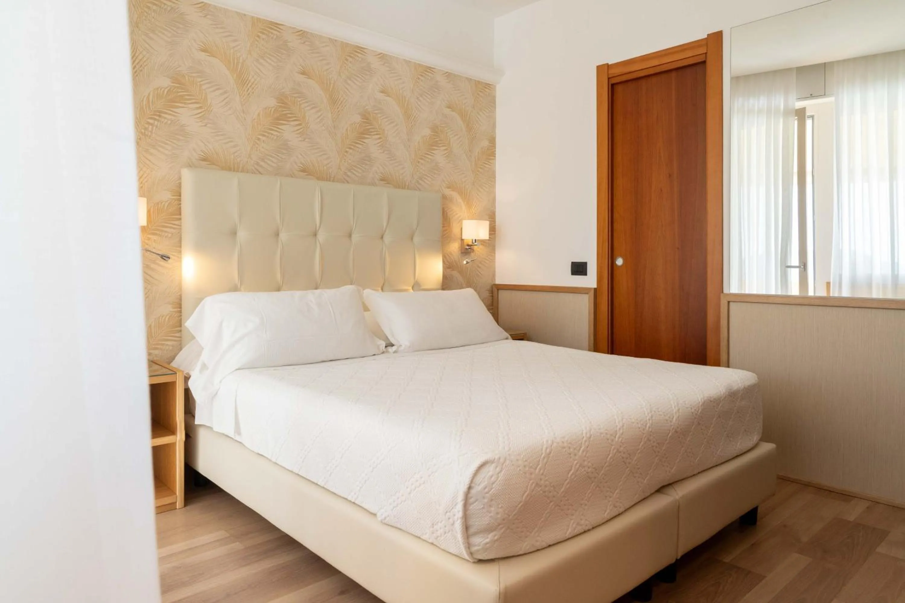 Bed in Hotel Florida Lerici