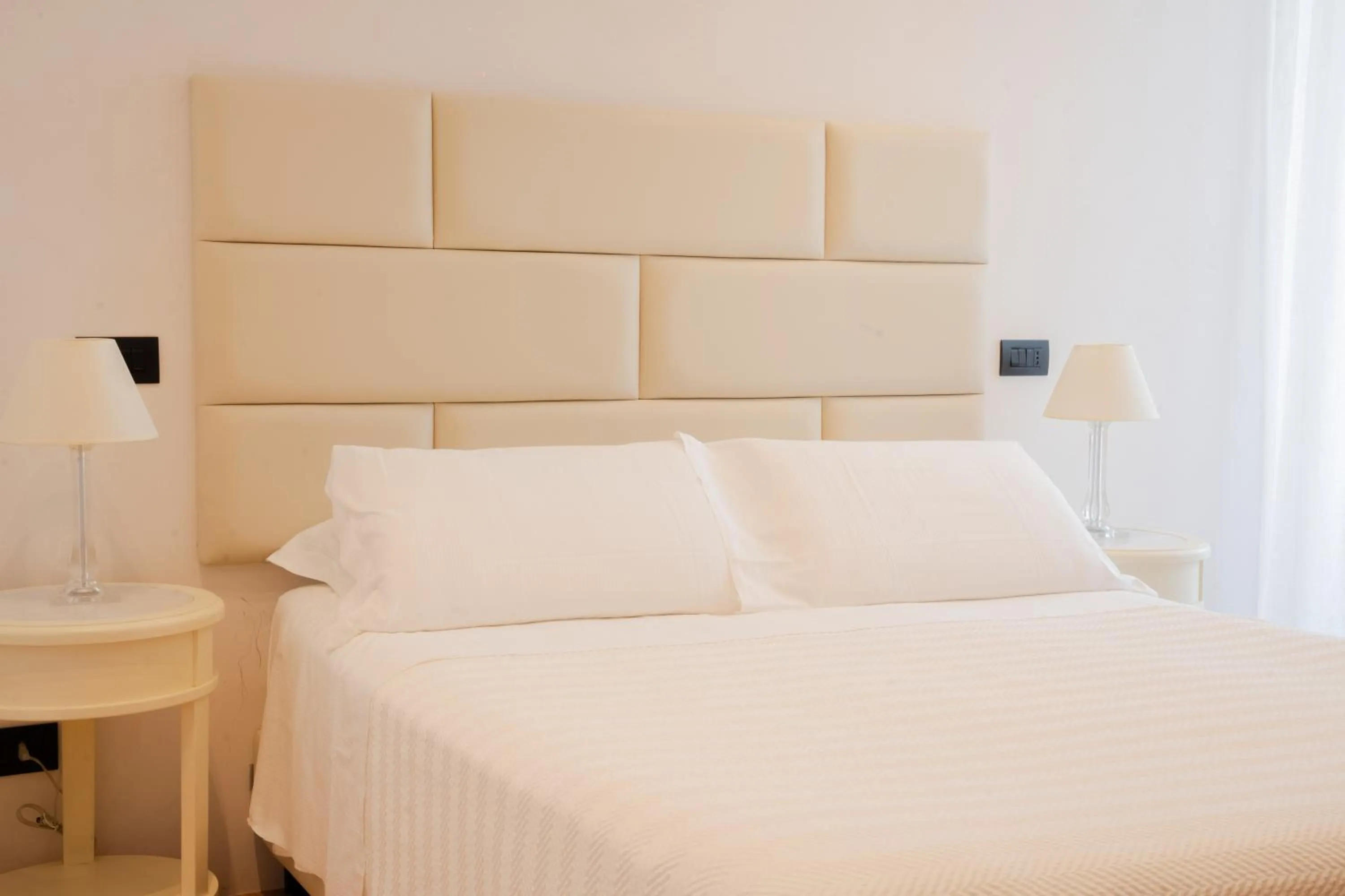 Bed in Hotel Florida Lerici