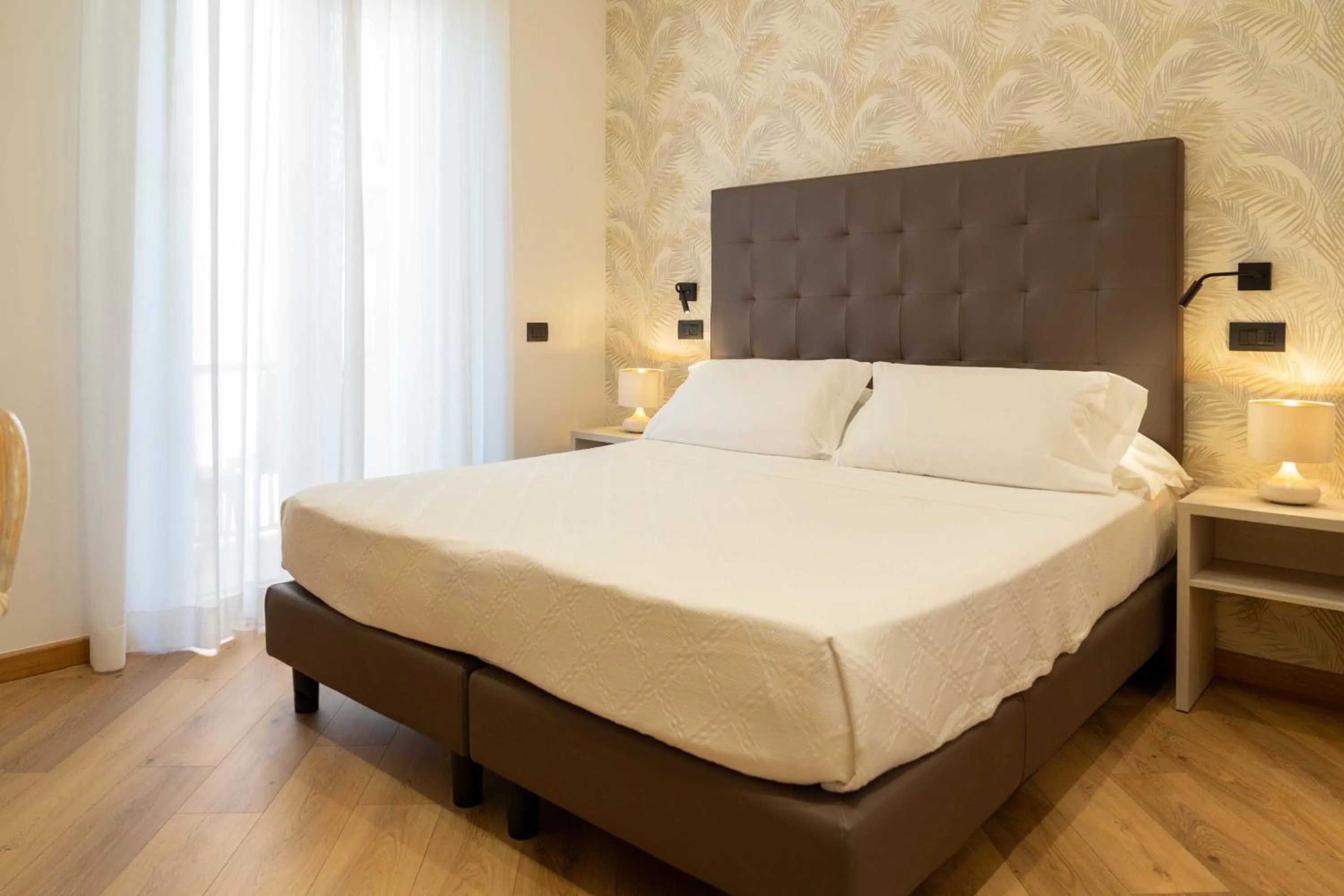 Bed in Hotel Florida Lerici
