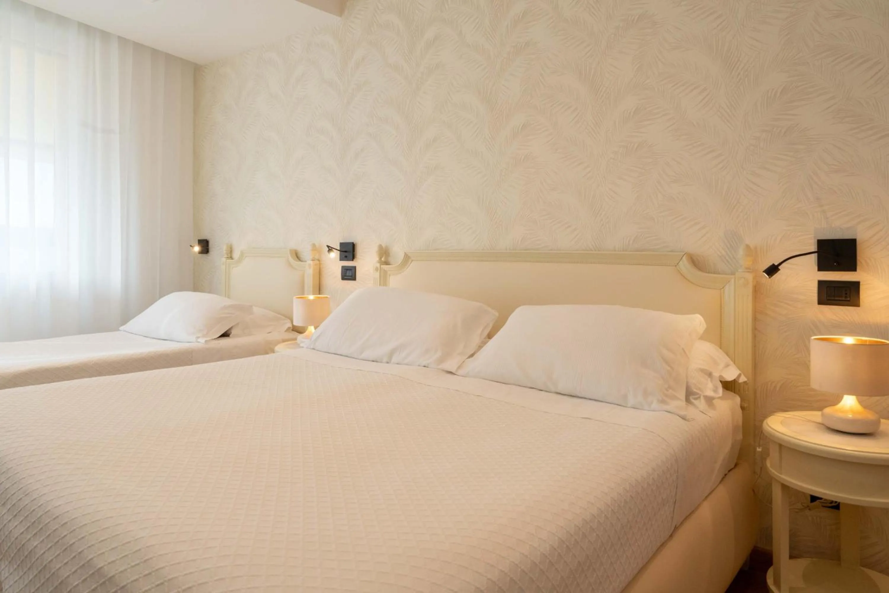 Bed in Hotel Florida Lerici