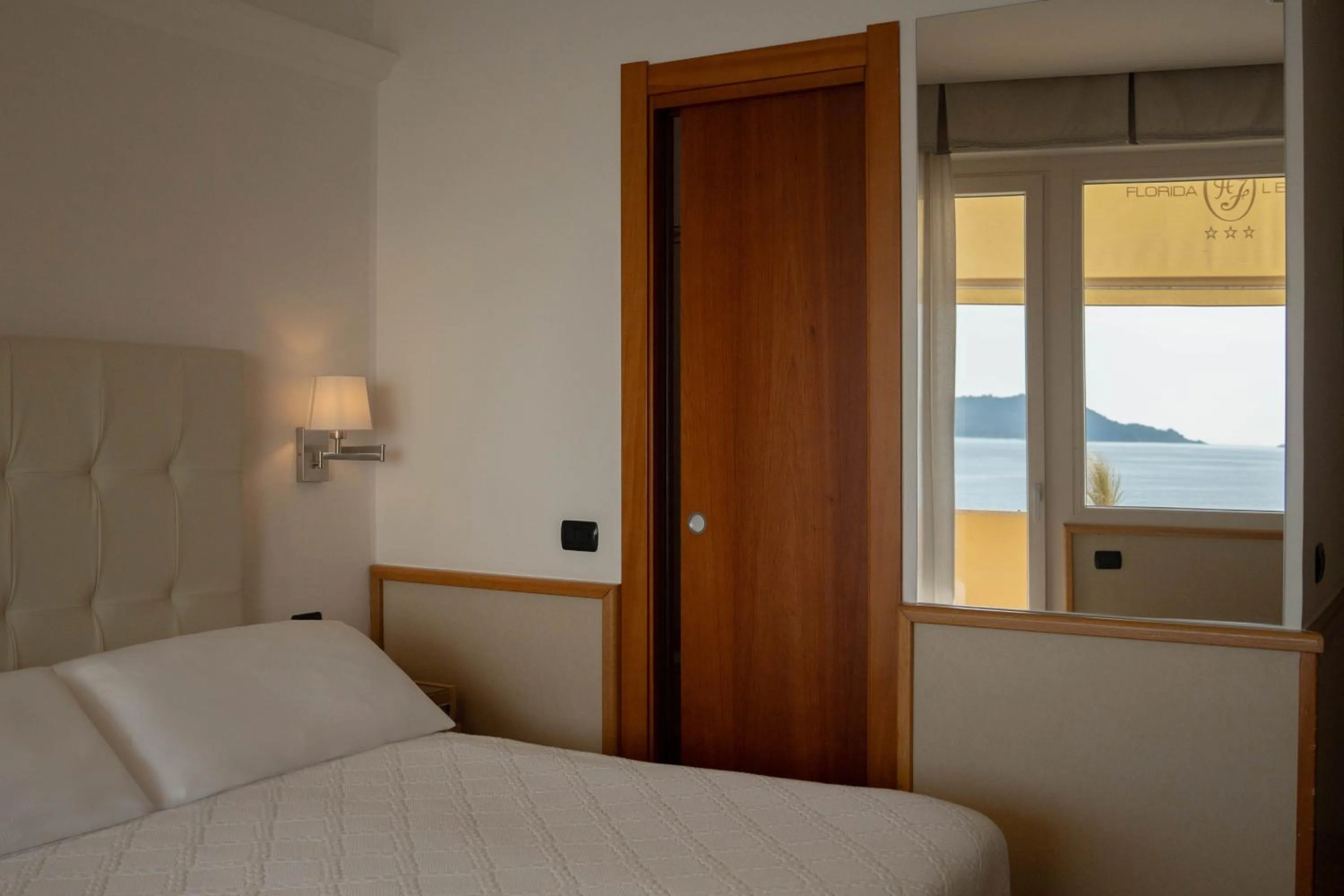 Bed in Hotel Florida Lerici
