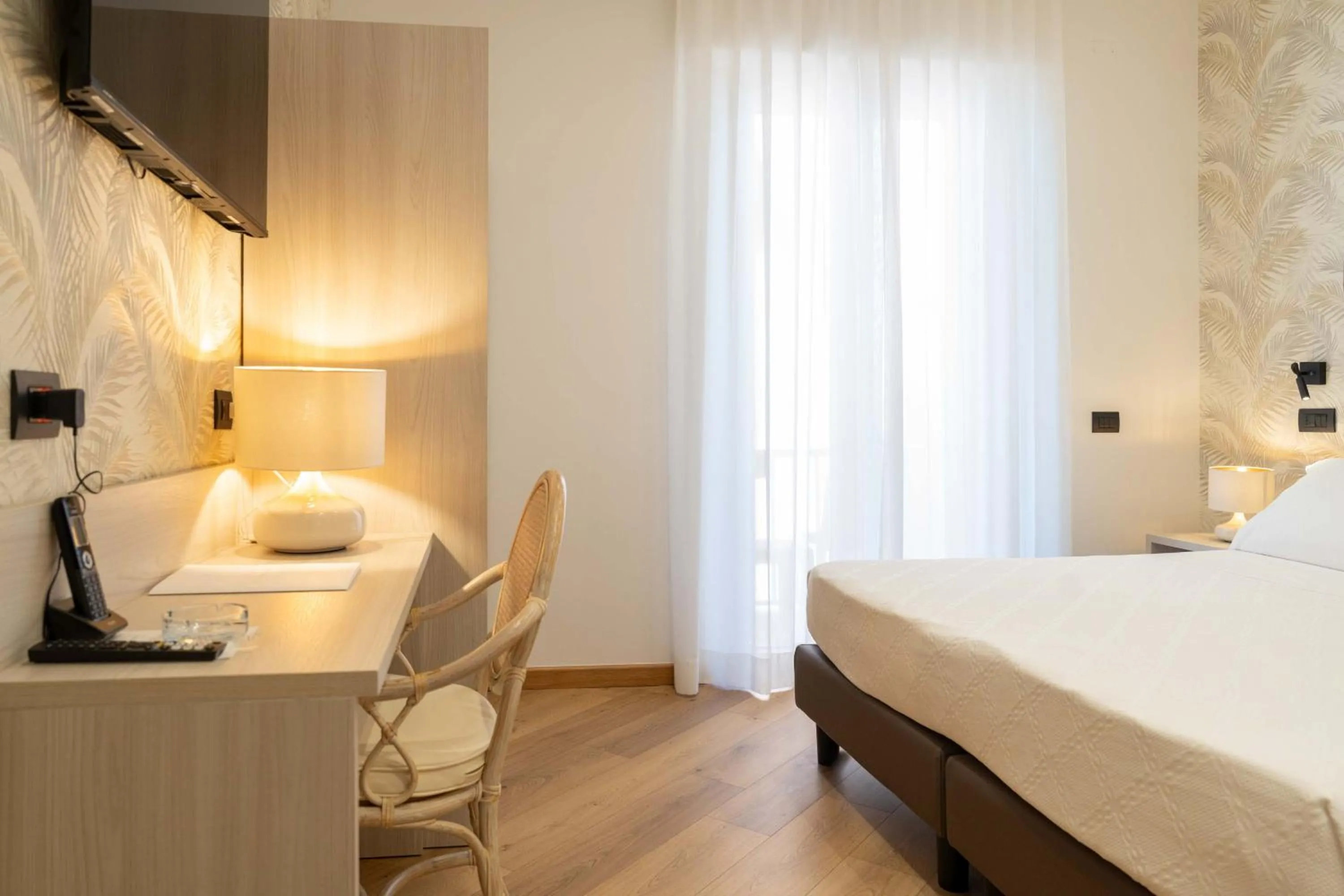 Bed in Hotel Florida Lerici