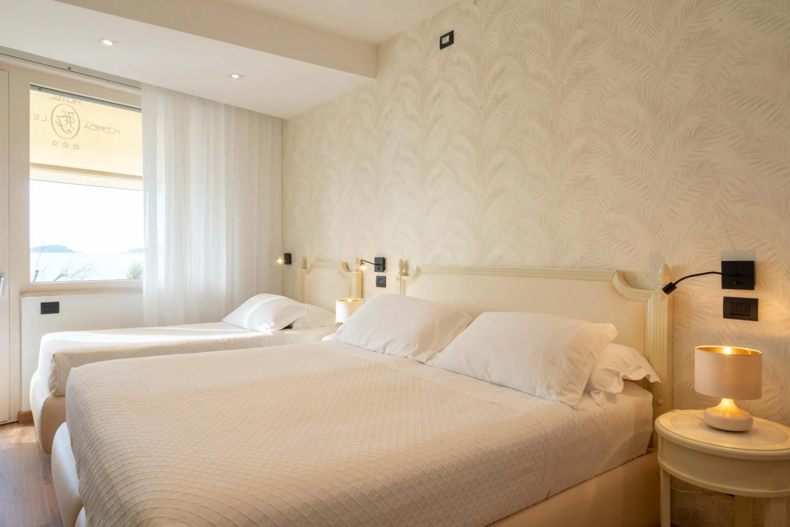 Bed in Hotel Florida Lerici