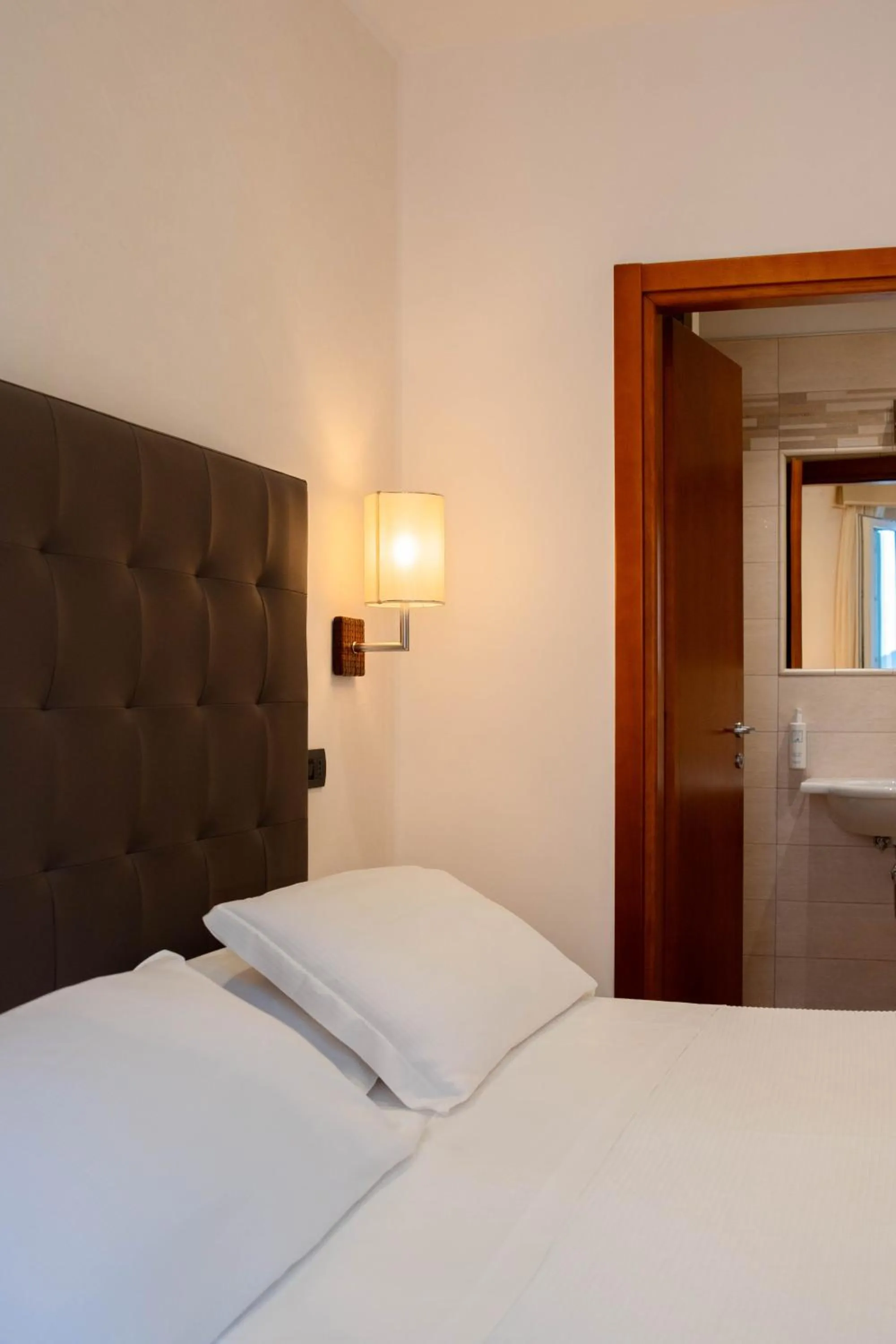 Bed in Hotel Florida Lerici