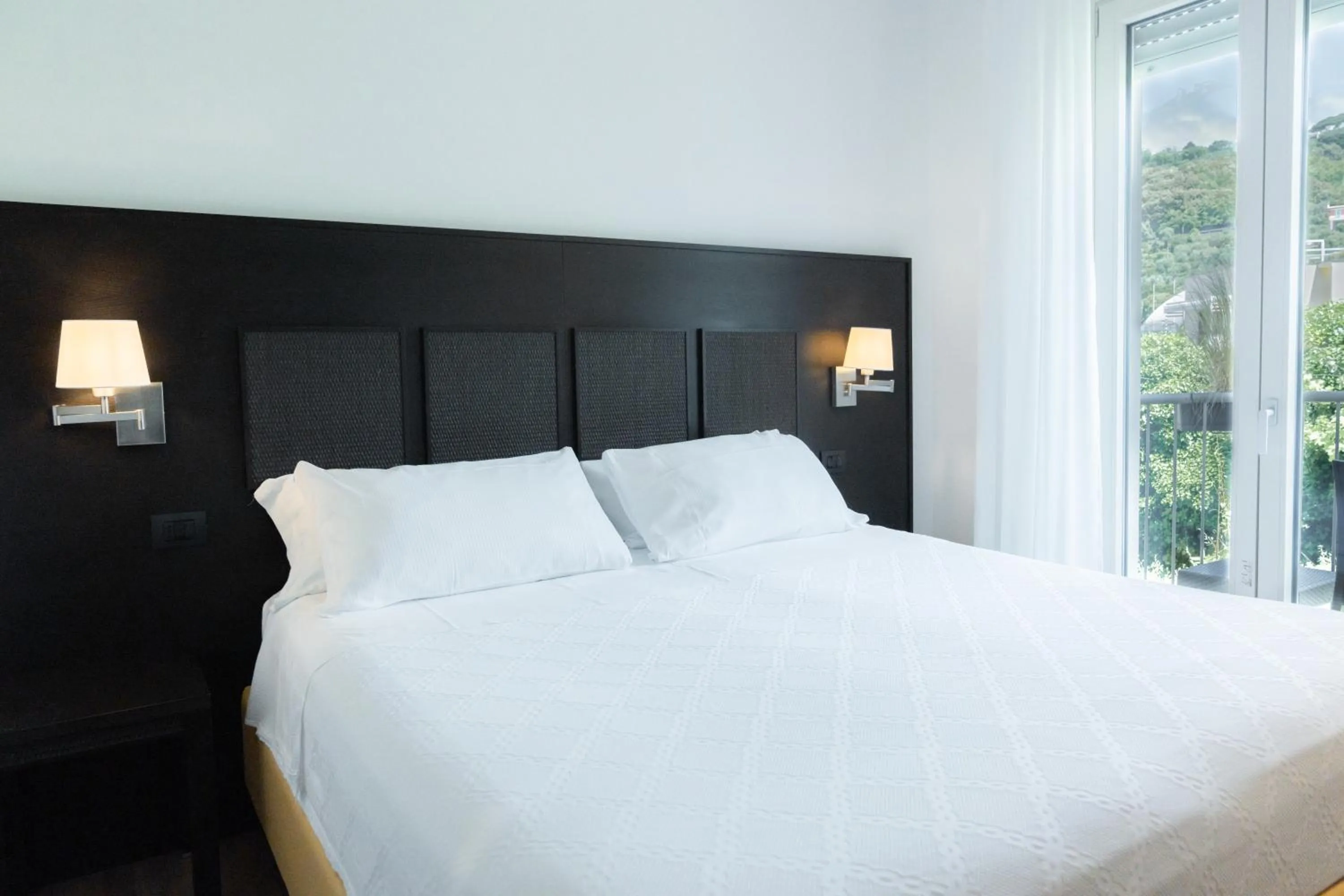 Bed in Hotel Florida Lerici