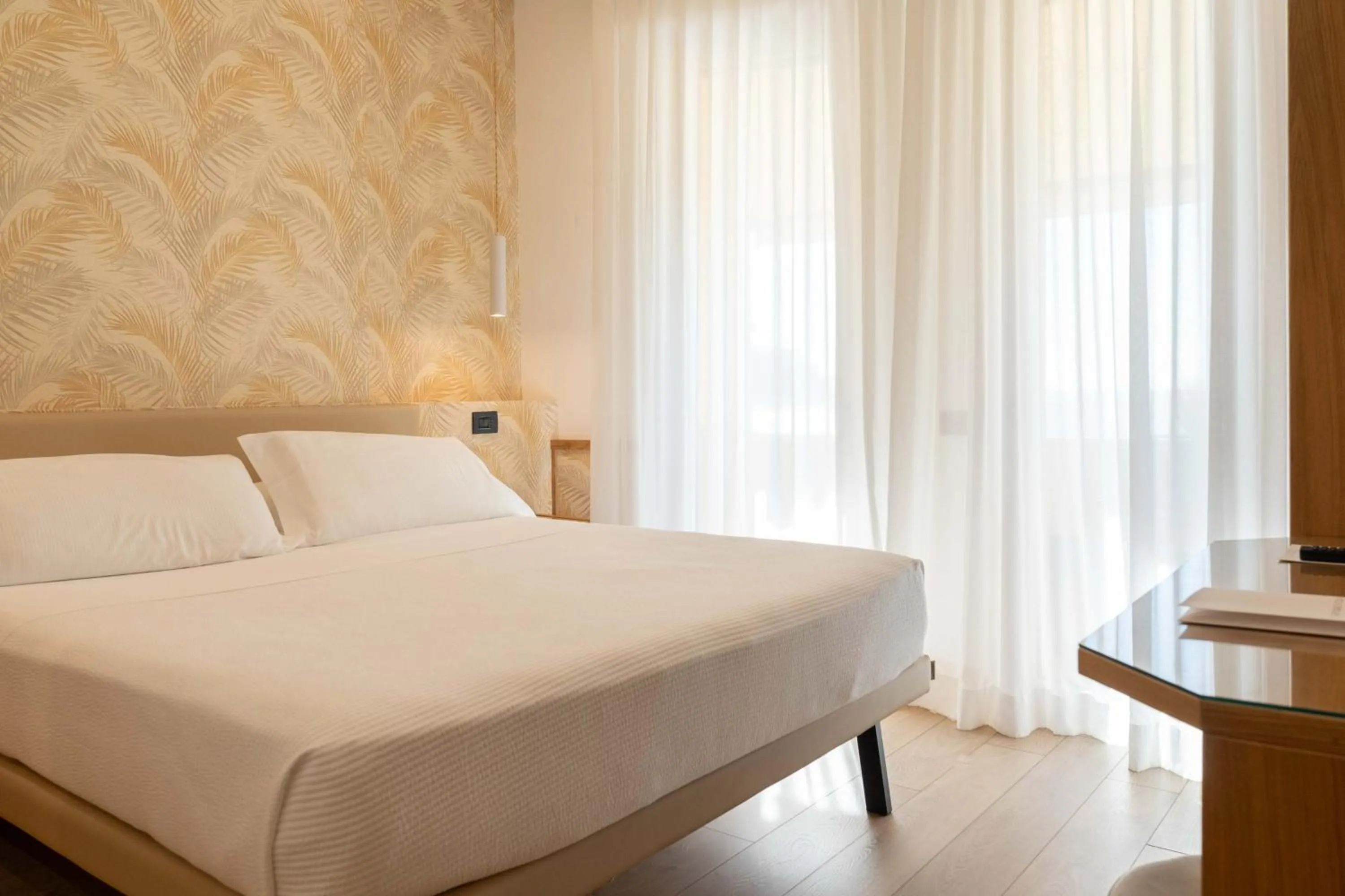 Bed in Hotel Florida Lerici