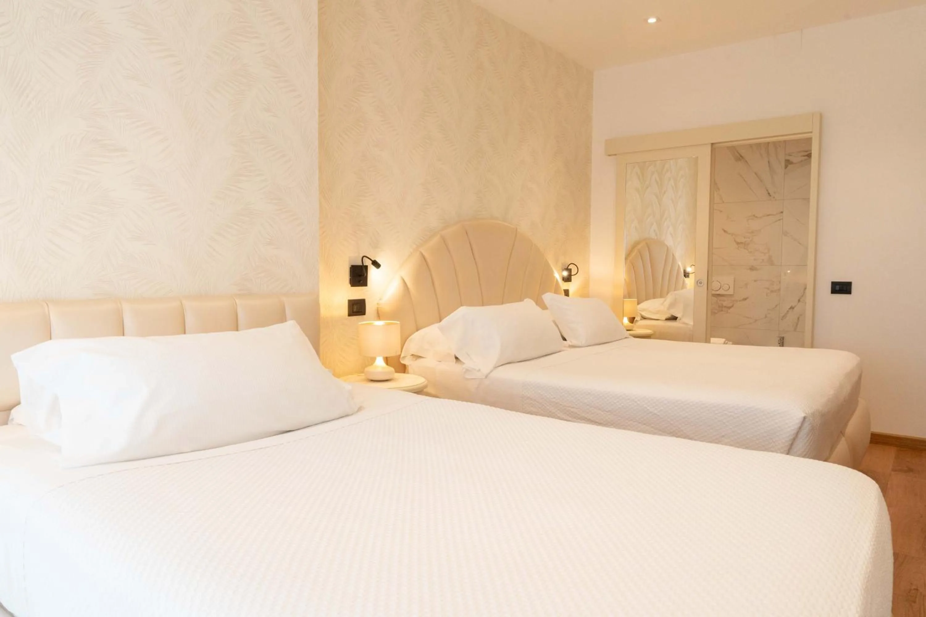 Bed in Hotel Florida Lerici