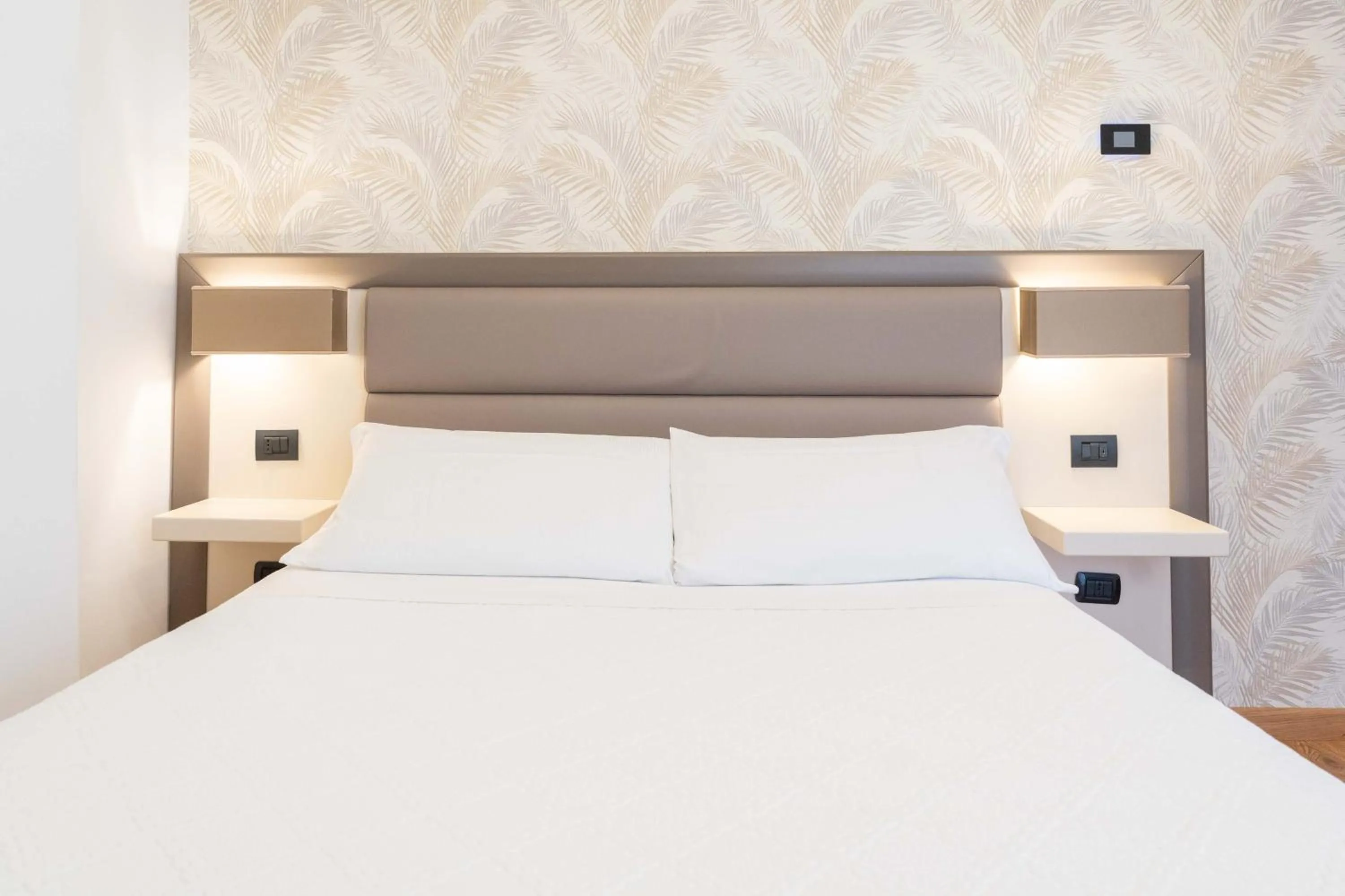 Bed in Hotel Florida Lerici