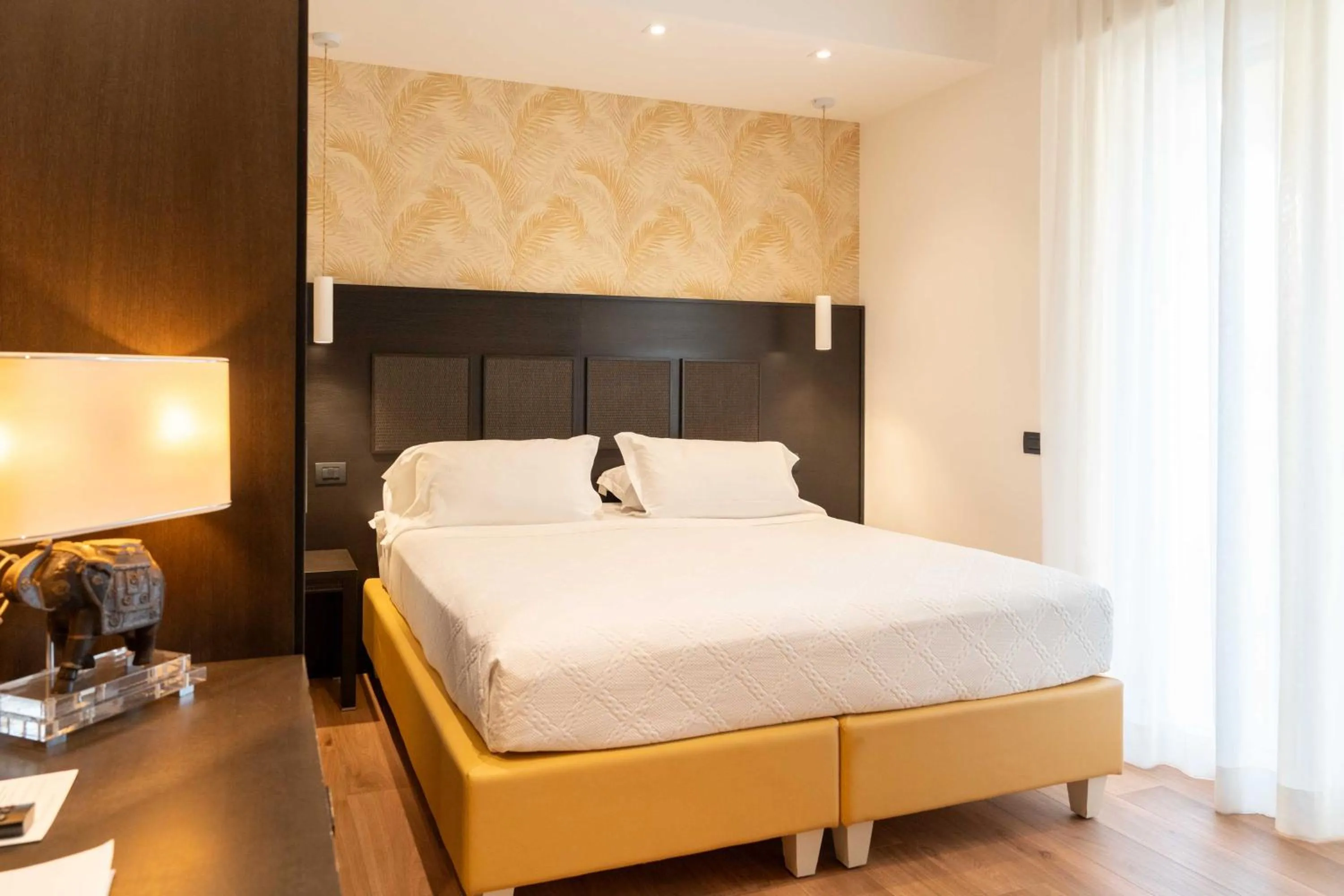 Bed in Hotel Florida Lerici