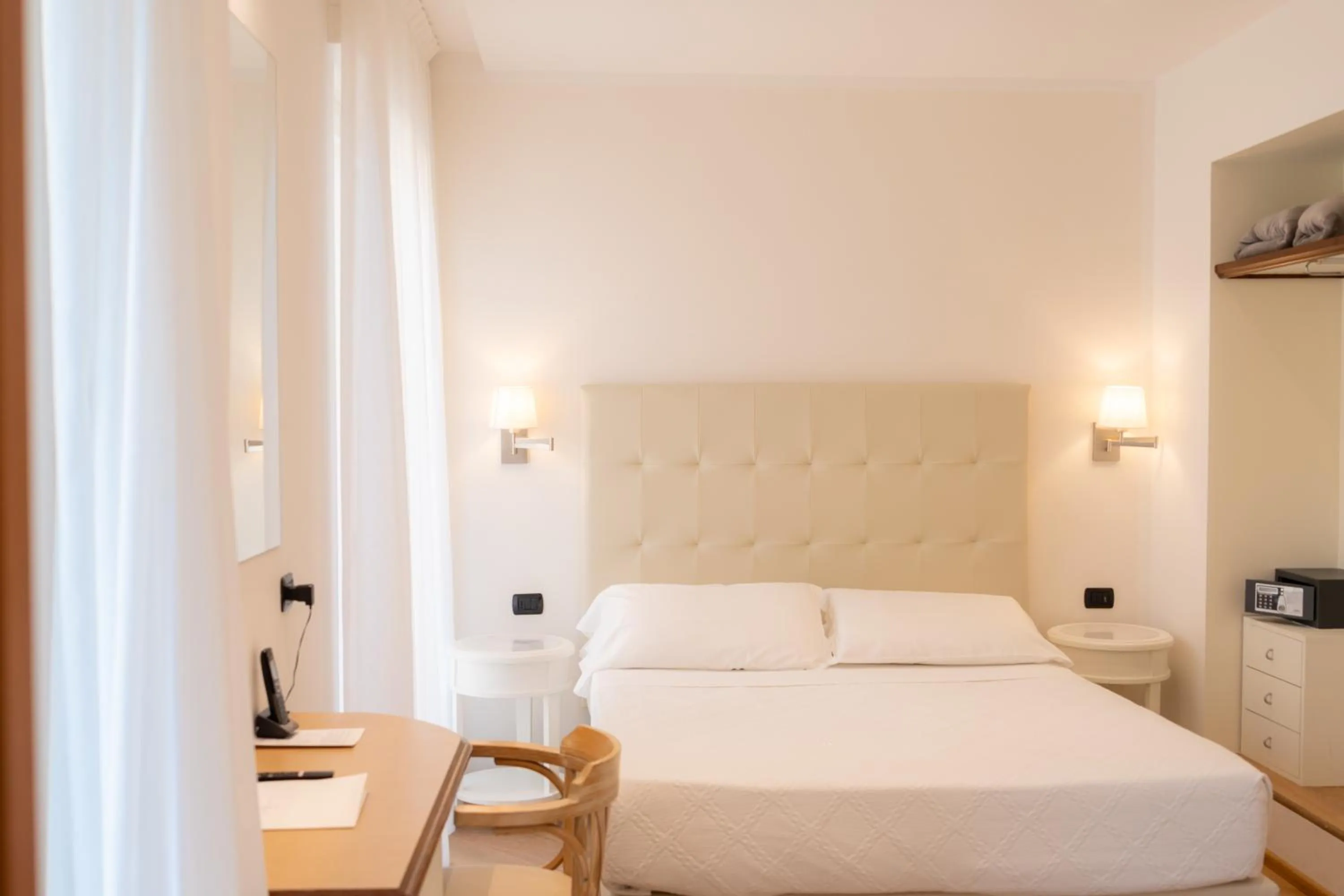 Bed in Hotel Florida Lerici