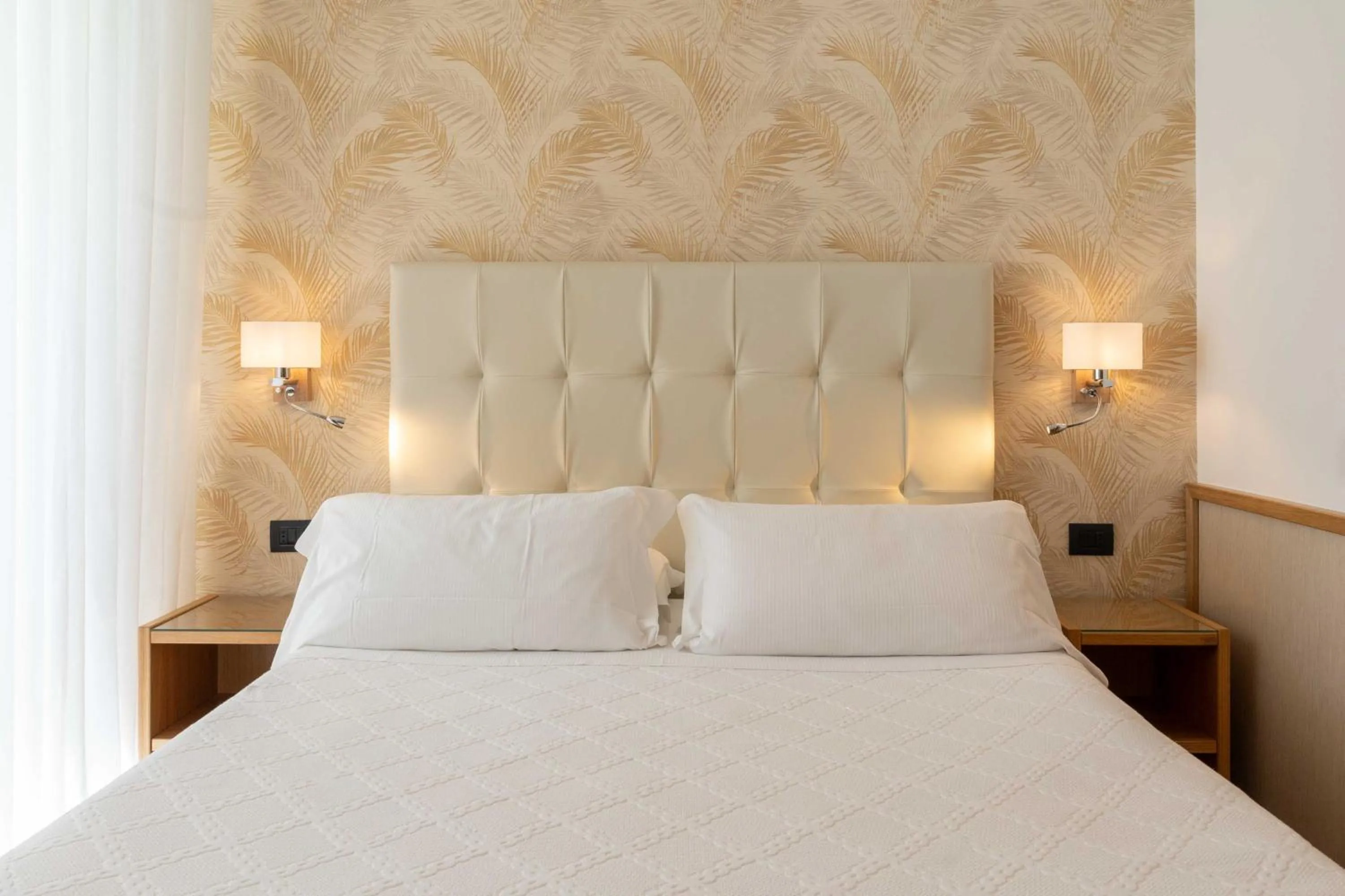 Bed in Hotel Florida Lerici