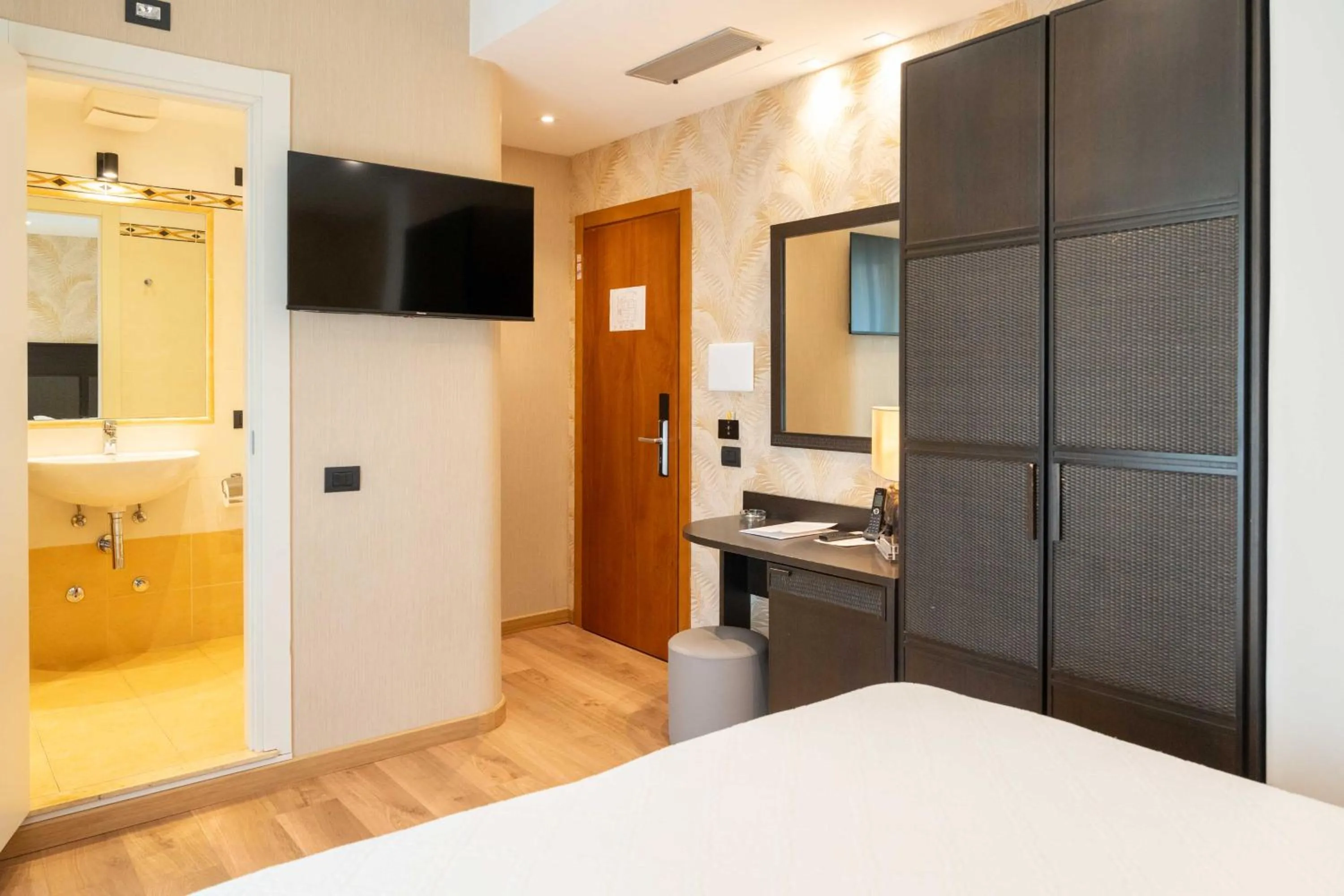 Bed in Hotel Florida Lerici