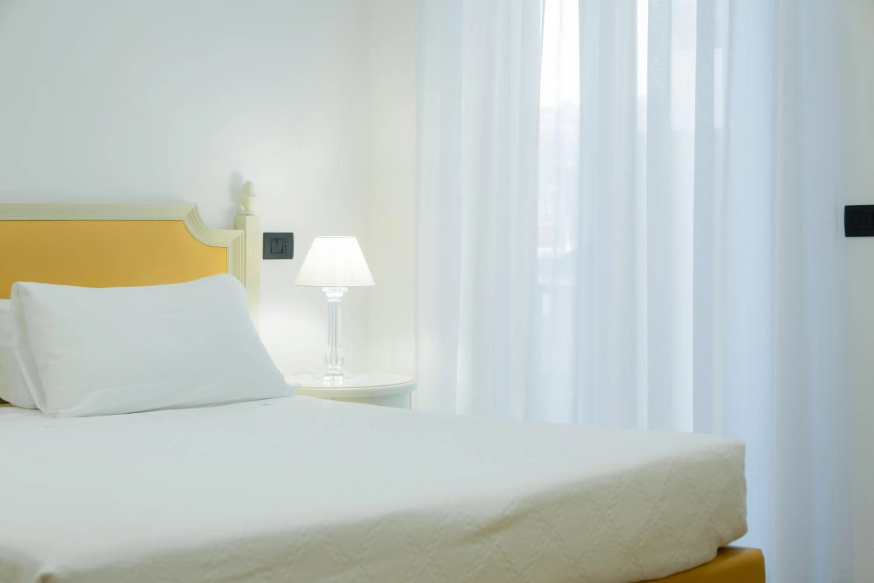 Bed in Hotel Florida Lerici