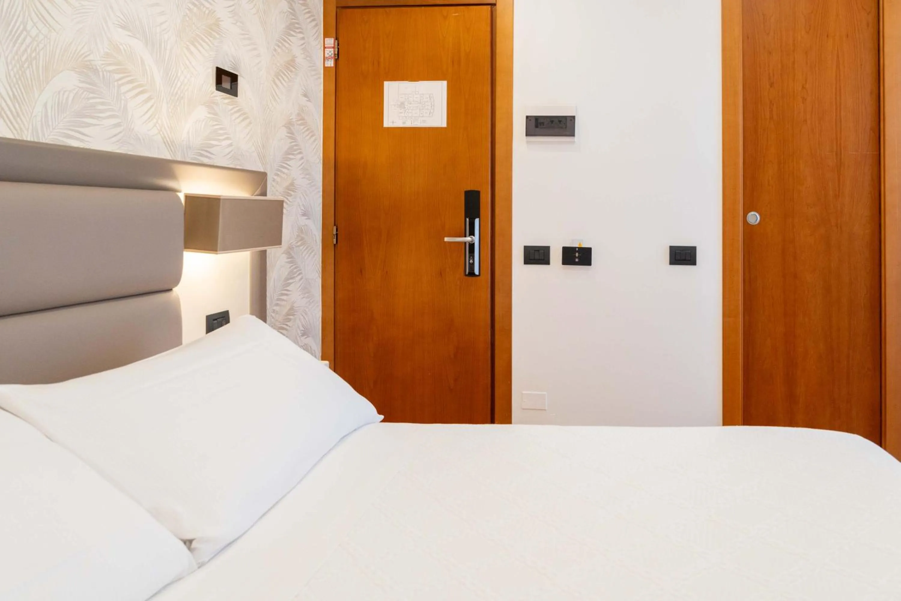 Bed in Hotel Florida Lerici