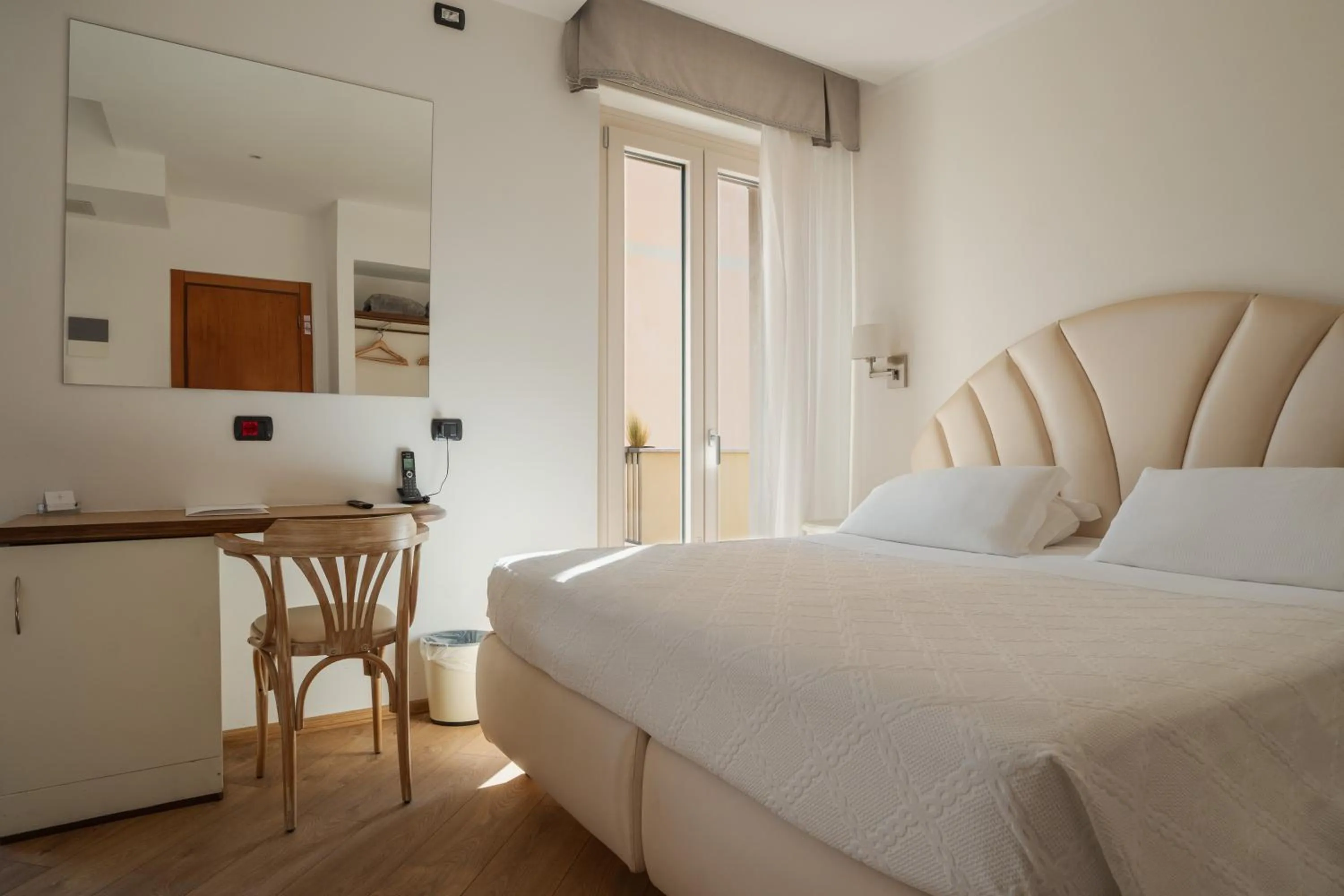 Bed in Hotel Florida Lerici