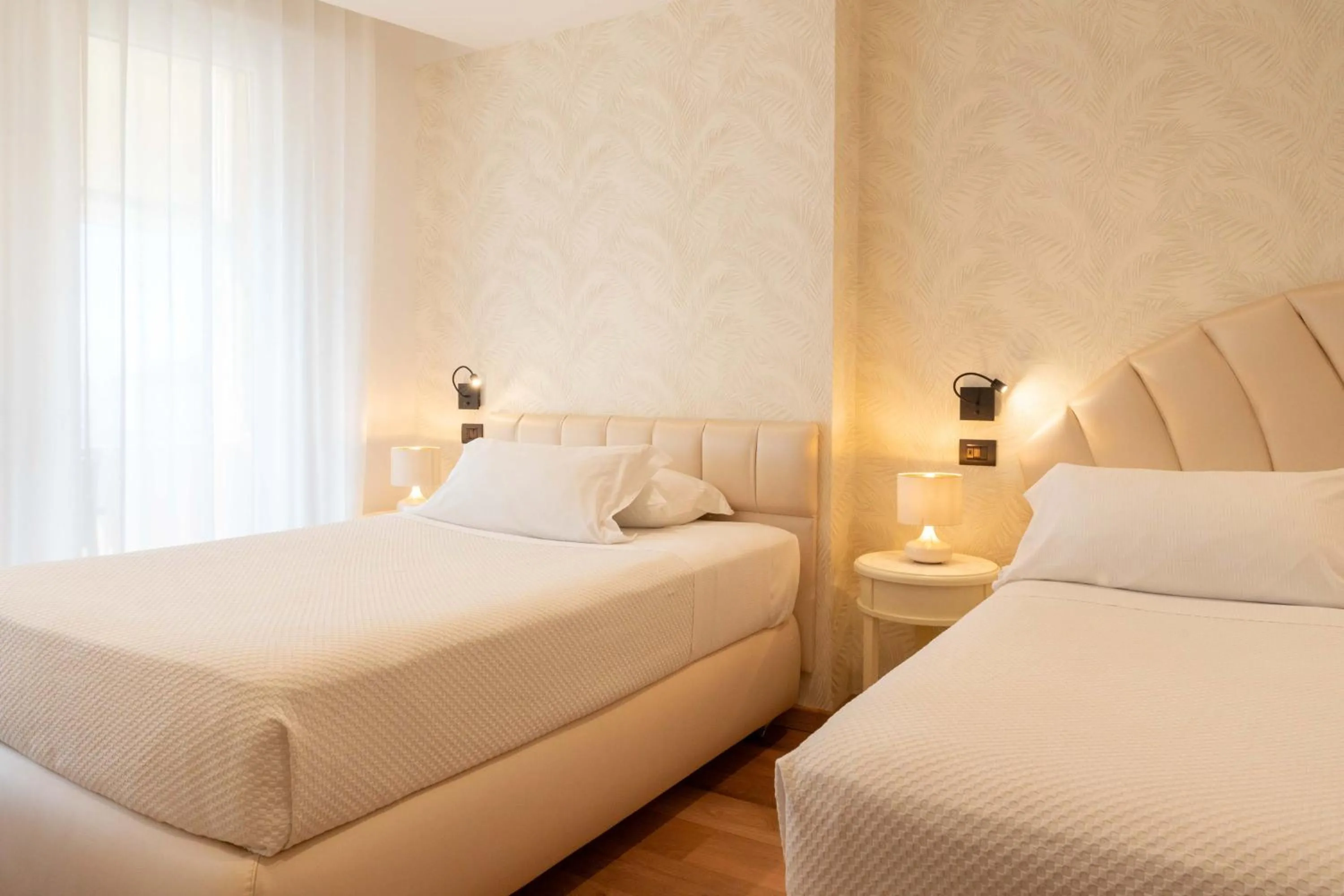 Bed in Hotel Florida Lerici