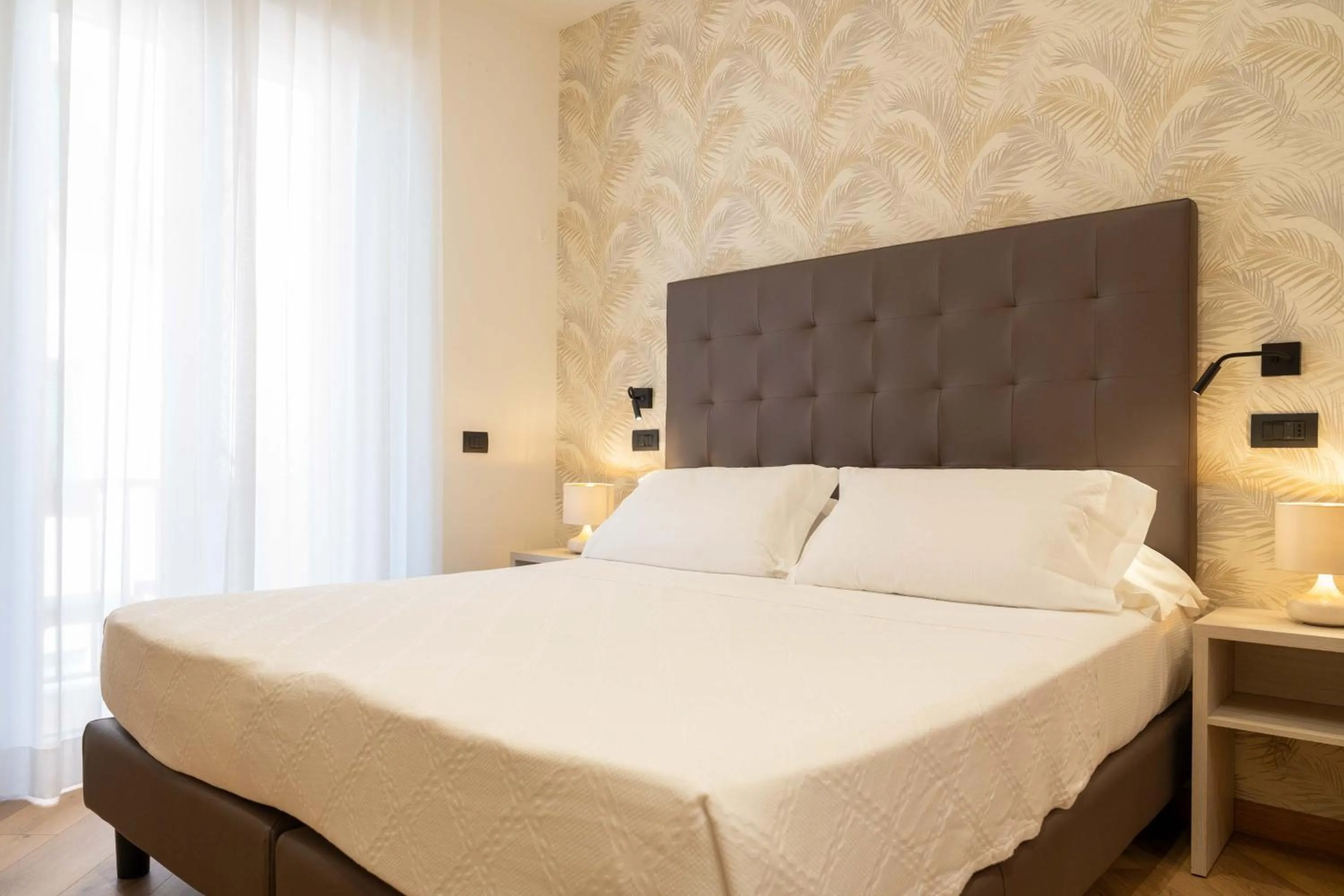 Bed in Hotel Florida Lerici