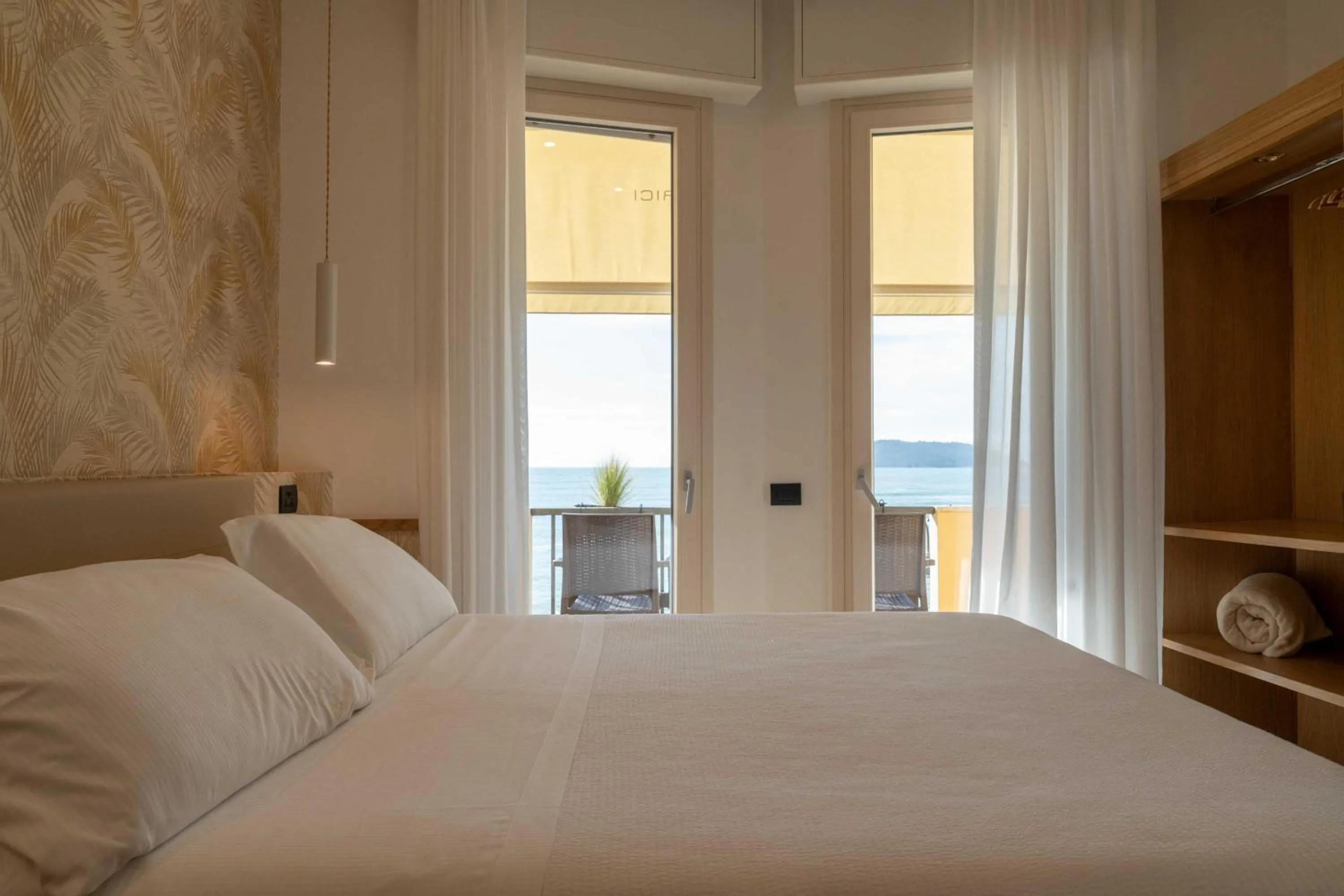 Bed in Hotel Florida Lerici