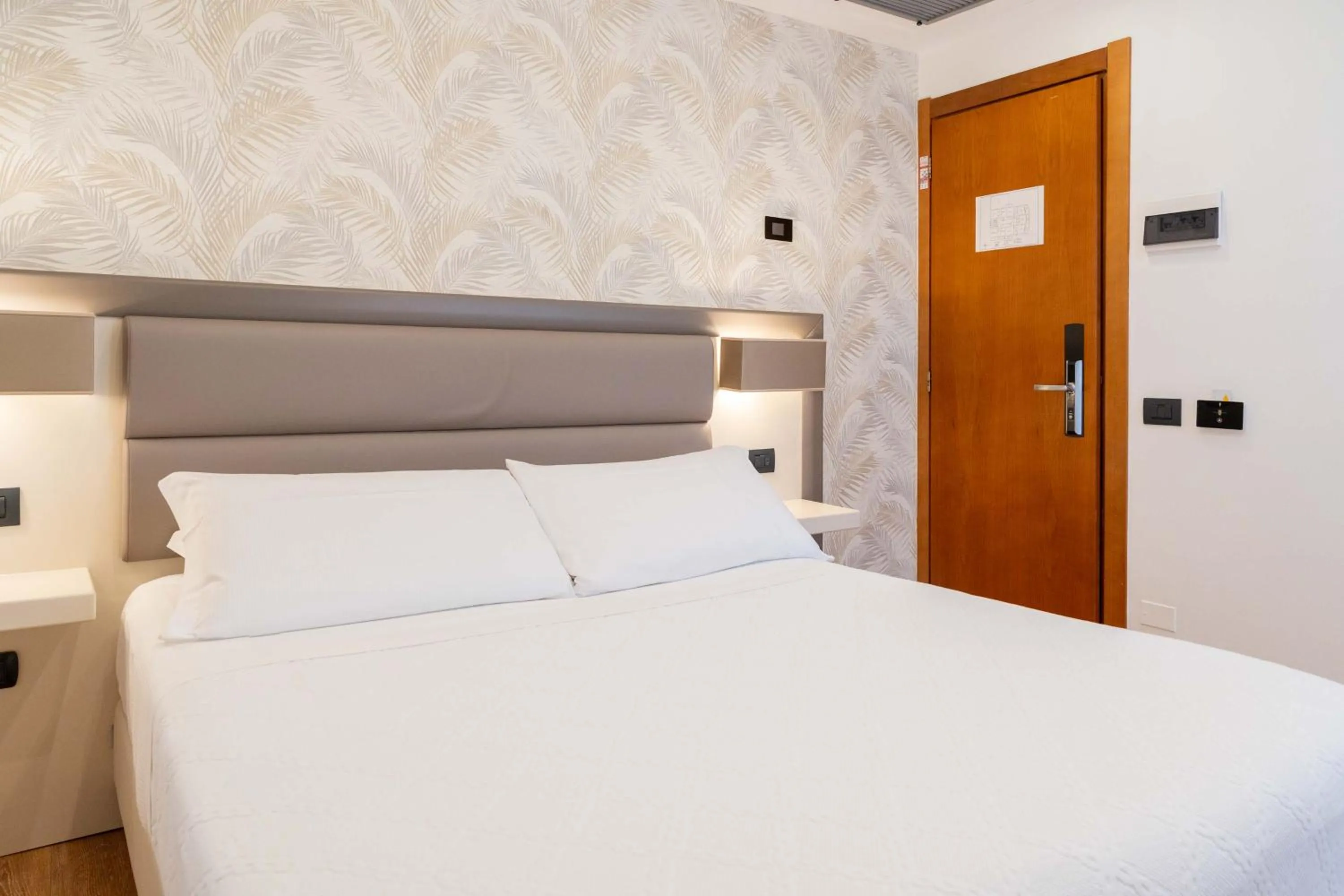 Bed in Hotel Florida Lerici