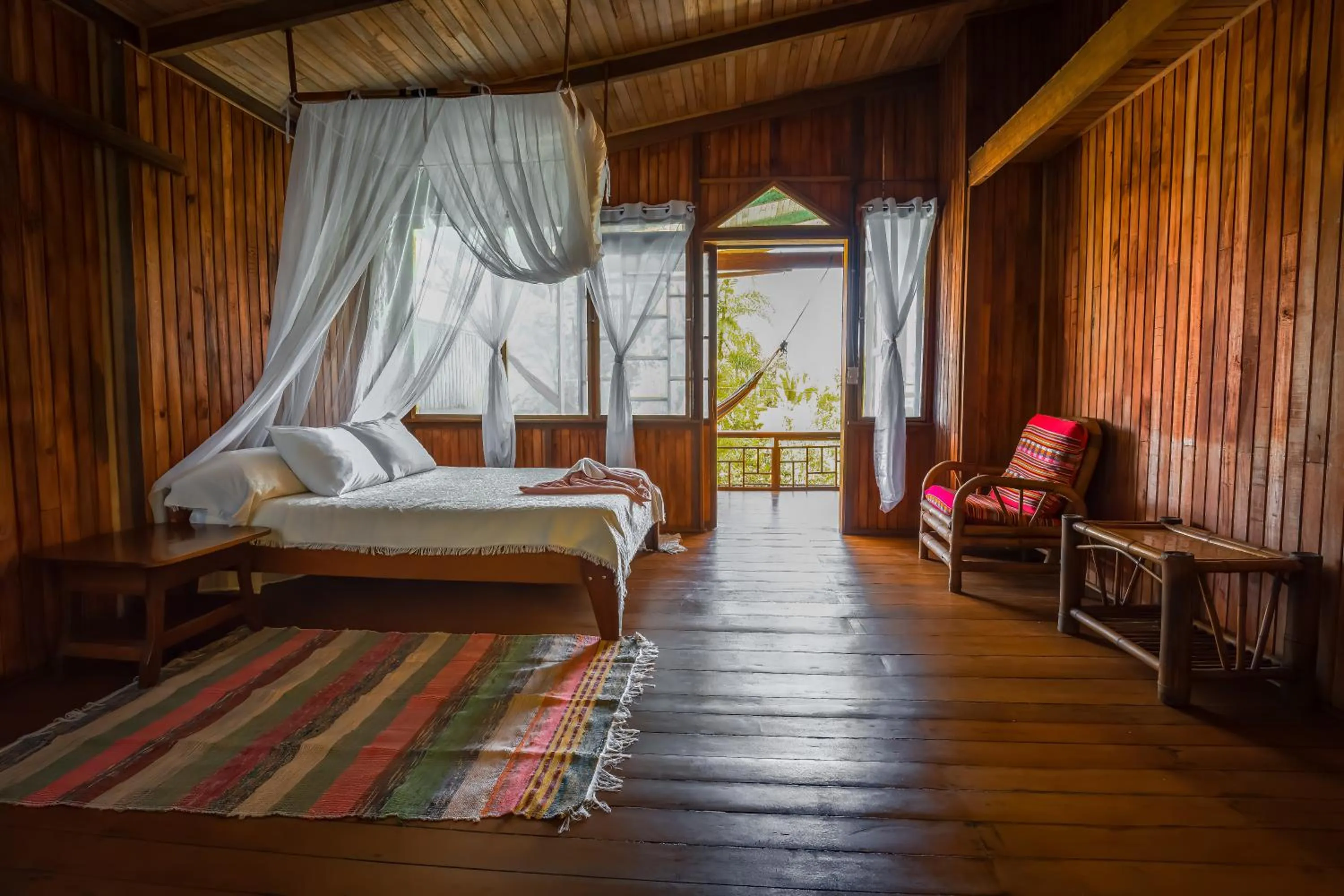 Bed in Ocean Forest Ecolodge