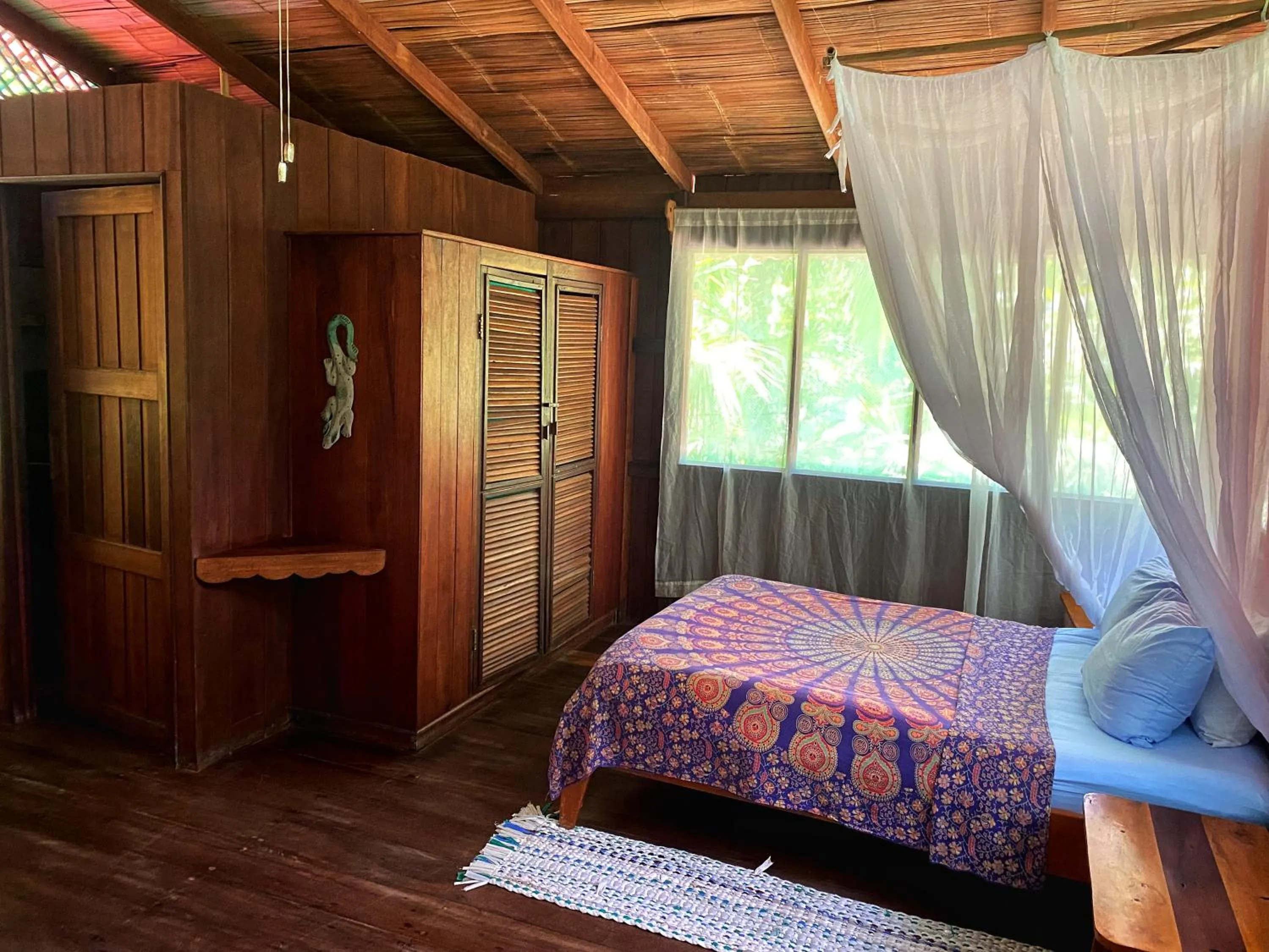 Bed in Ocean Forest Ecolodge