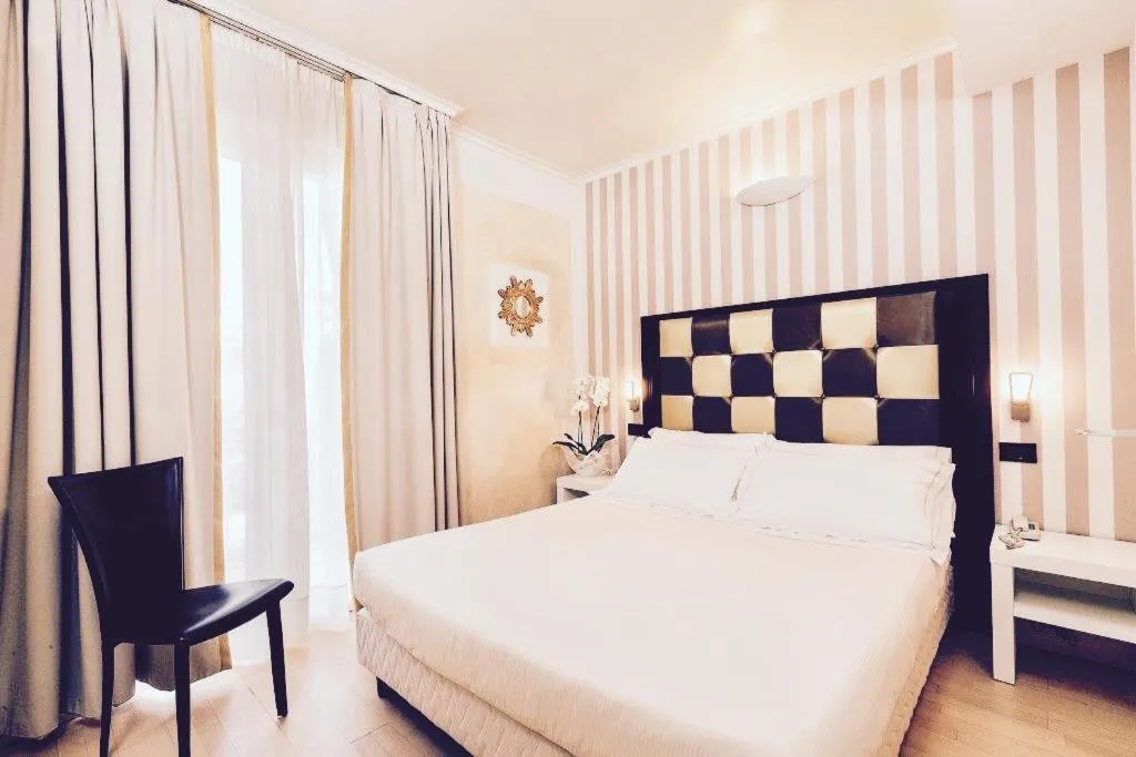 Bed in JR Resort Logos Forte dei Marmi