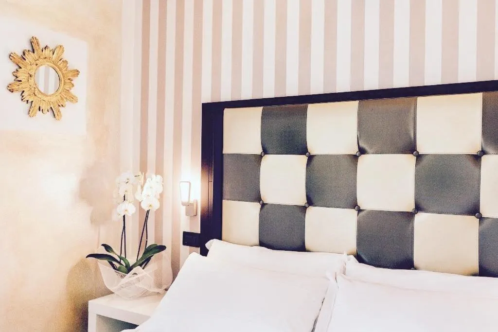 Bed in JR Resort Logos Forte dei Marmi