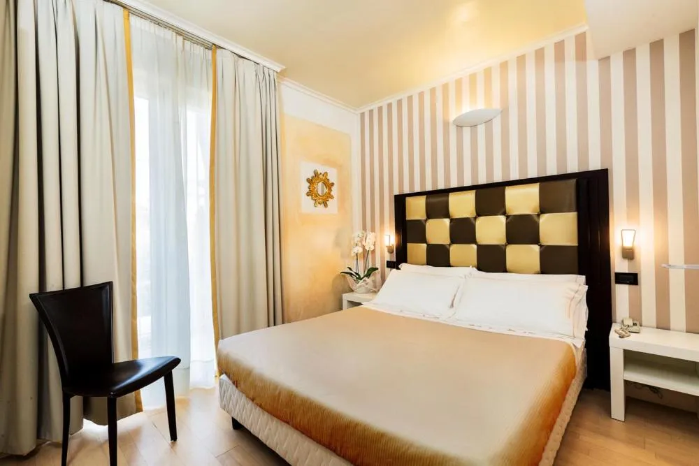 Bed in JR Resort Logos Forte dei Marmi