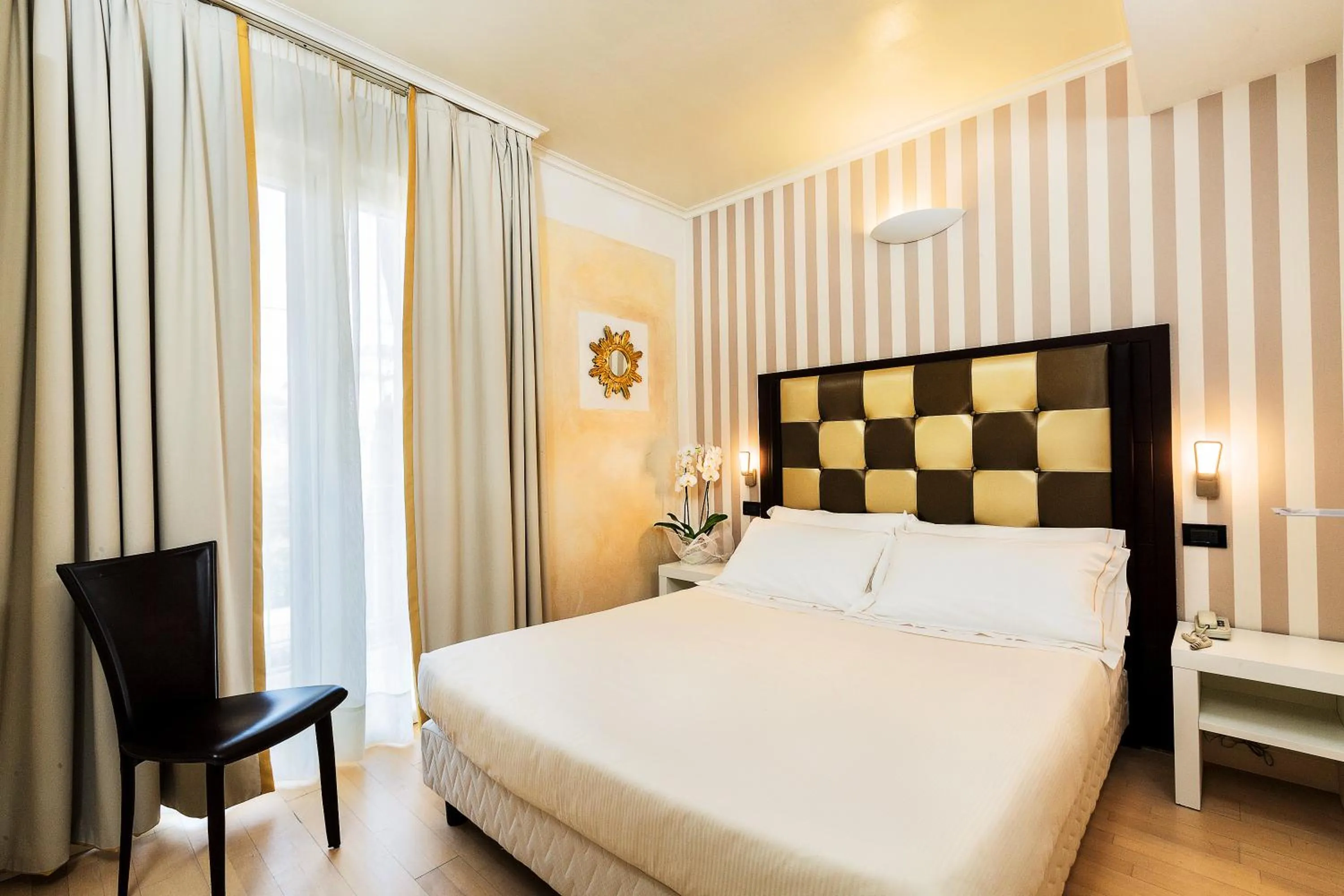 Bed in JR Resort Logos Forte dei Marmi