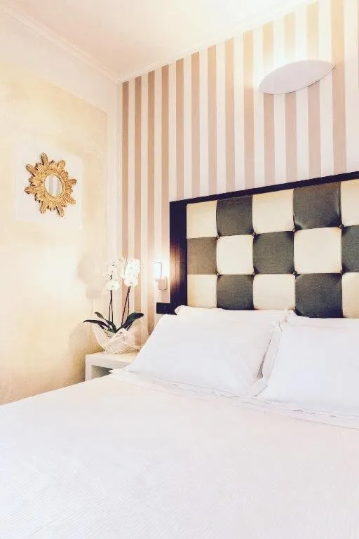 Bed in JR Resort Logos Forte dei Marmi