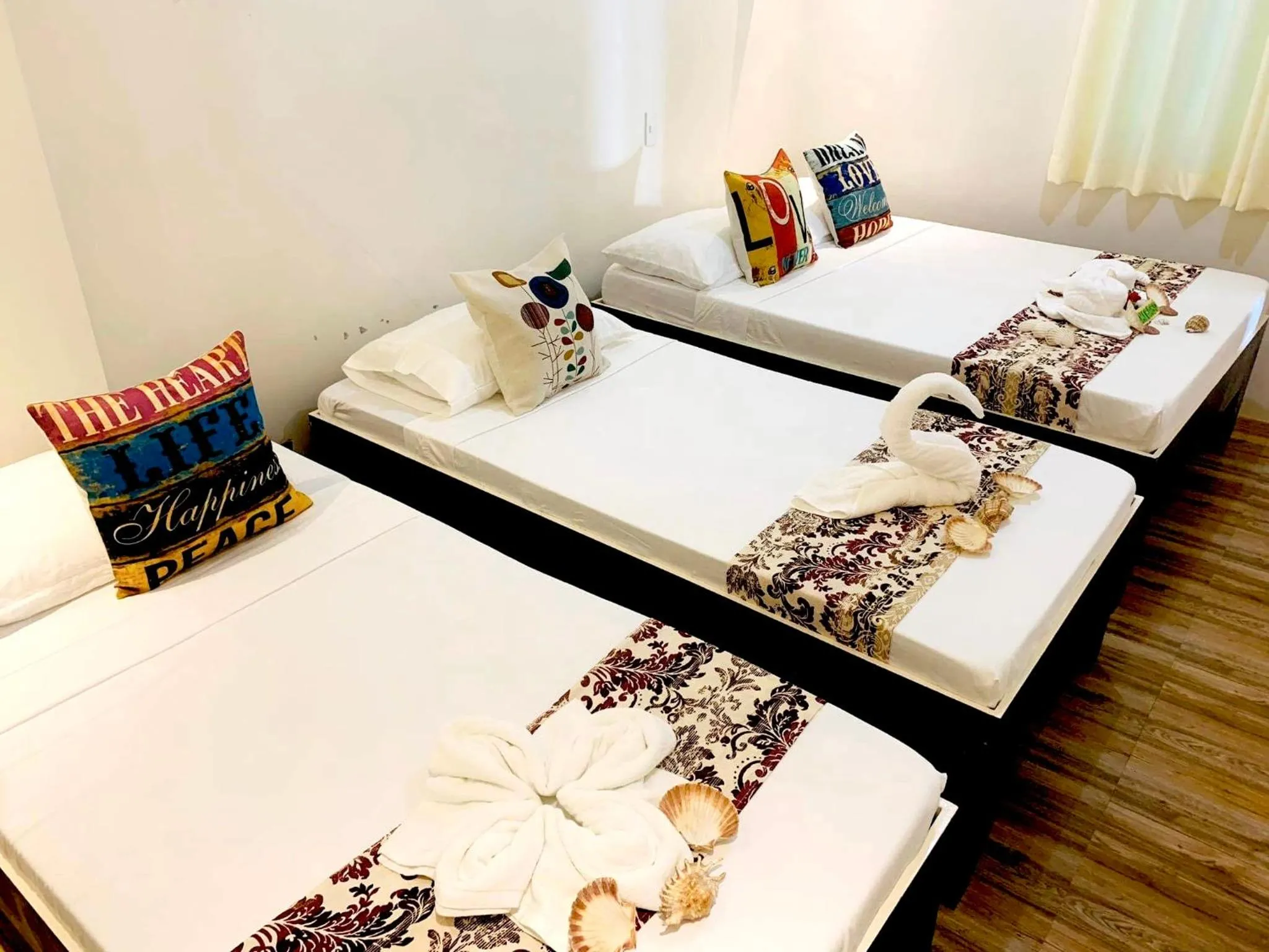 Bed in PamAnilao and Padoy's Dive Camp