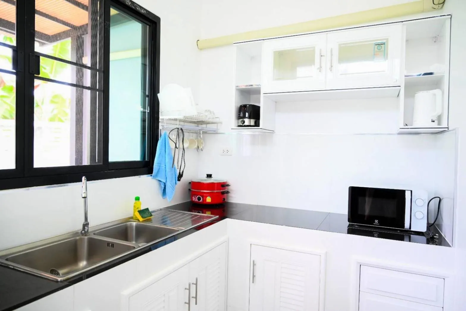 Kitchen or kitchenette in Baan Nern Khao Resort Pattaya