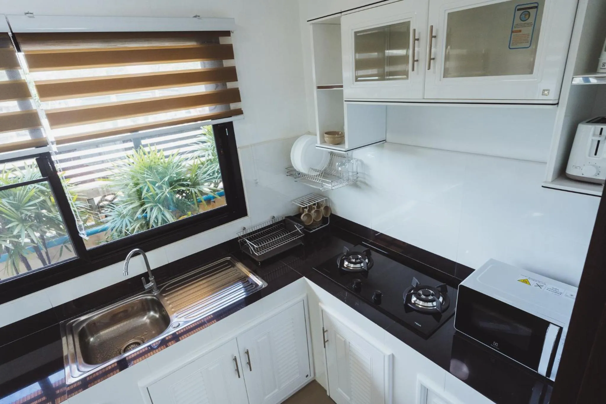 Kitchen or kitchenette in Baan Nern Khao Resort Pattaya