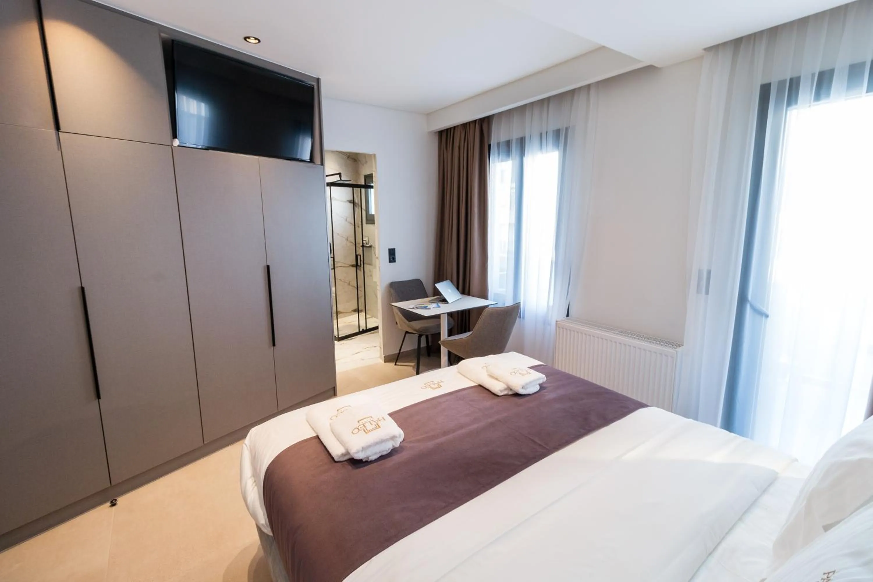 Property building, Bed in Paleo Suites