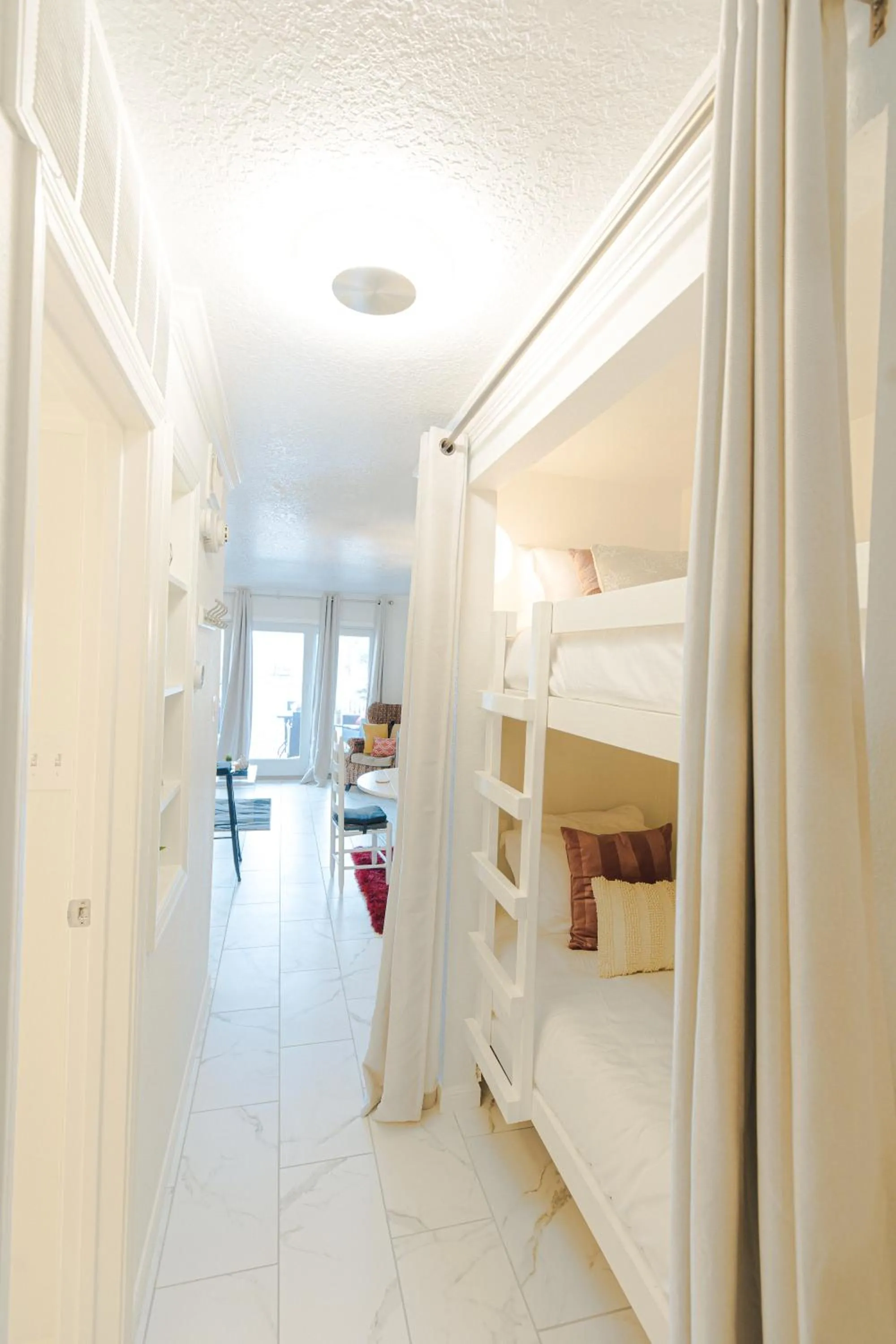 bunk bed in Crimson Beach Escape Ocean View-HotTub -Pool-LongStay - 1 Queen Bedroom plus Alcove bunk Beds and a Sofa