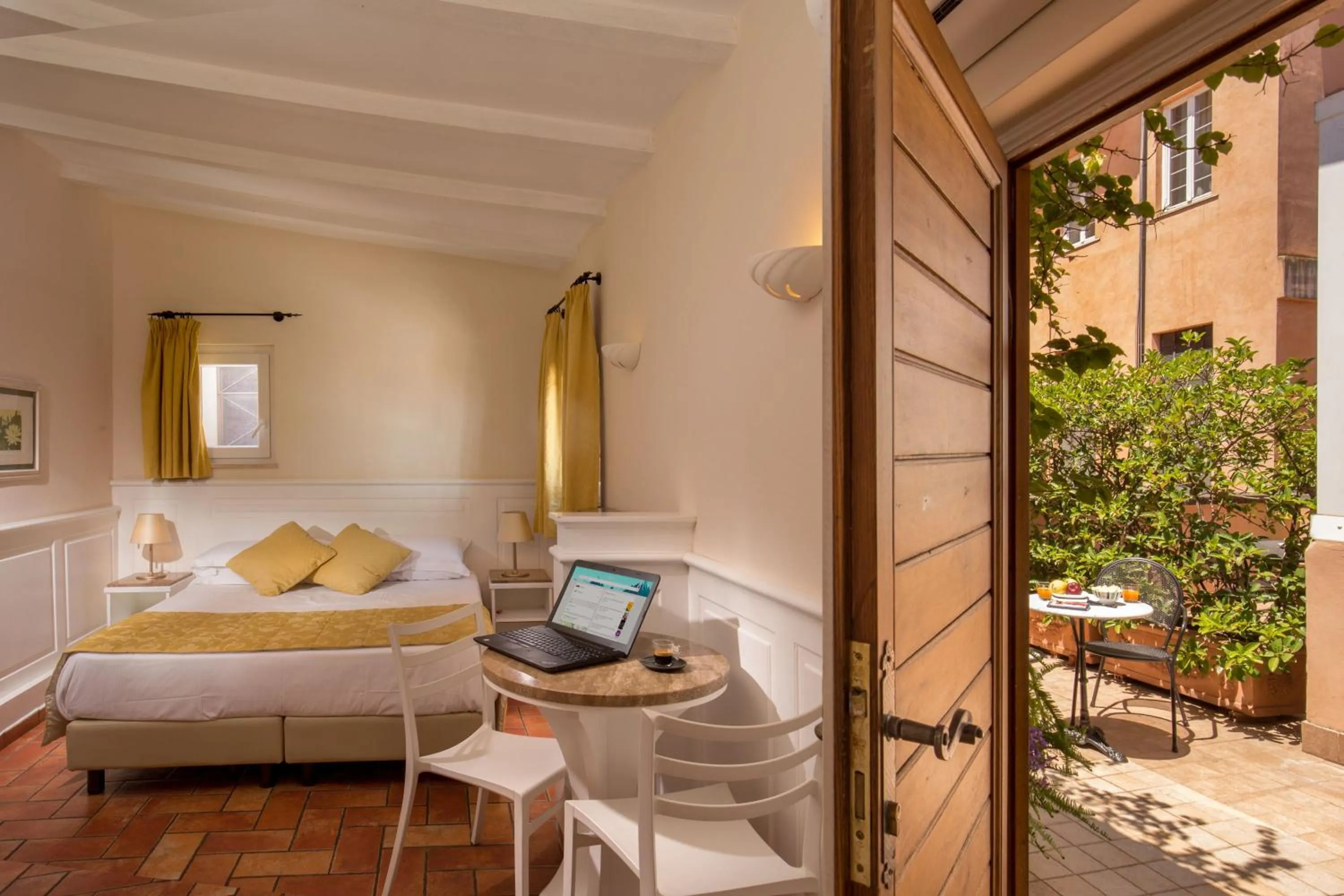 Patio, Bed in Aenea Inn