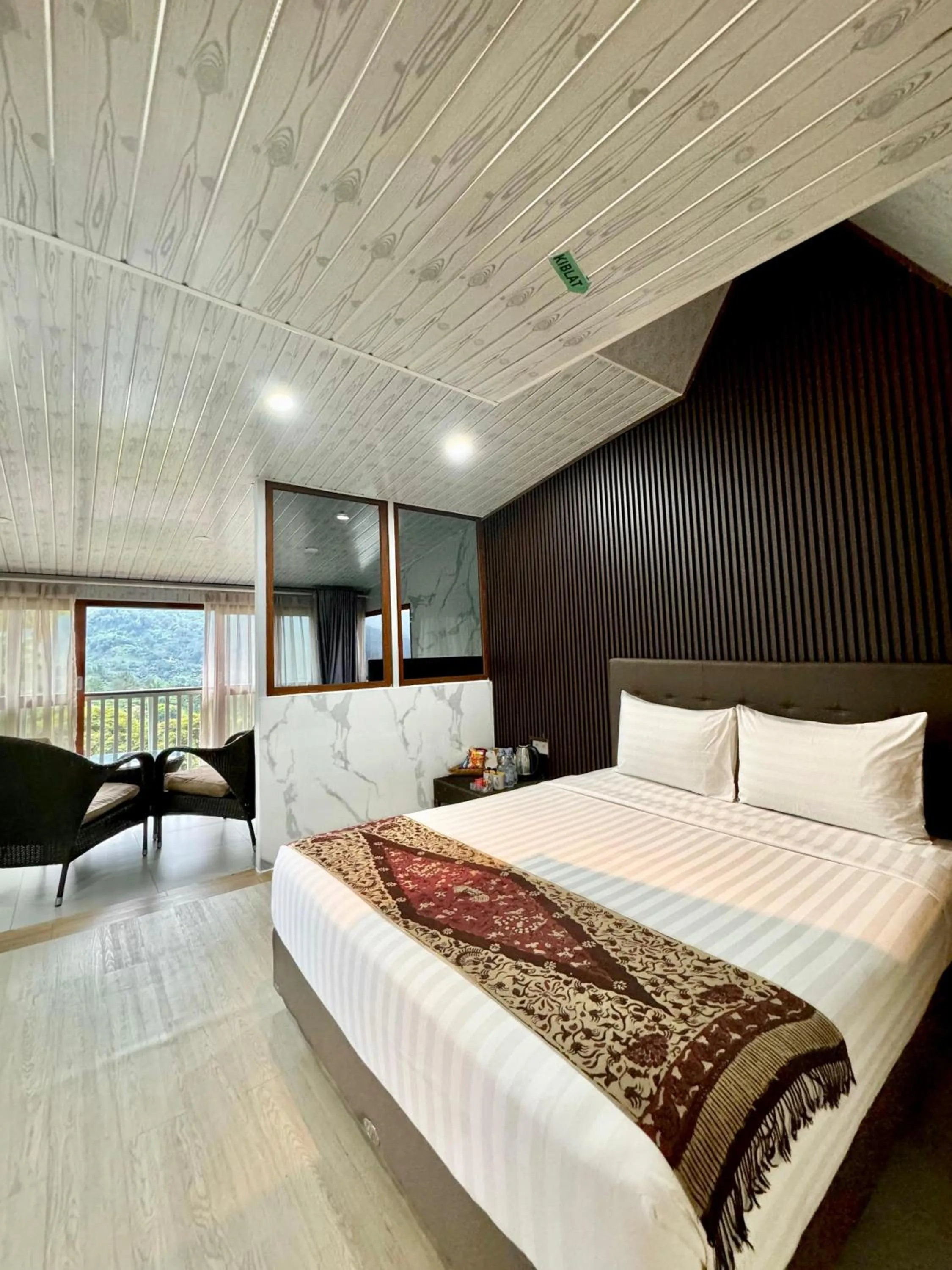 Bed in De Pointé Resort & Resto