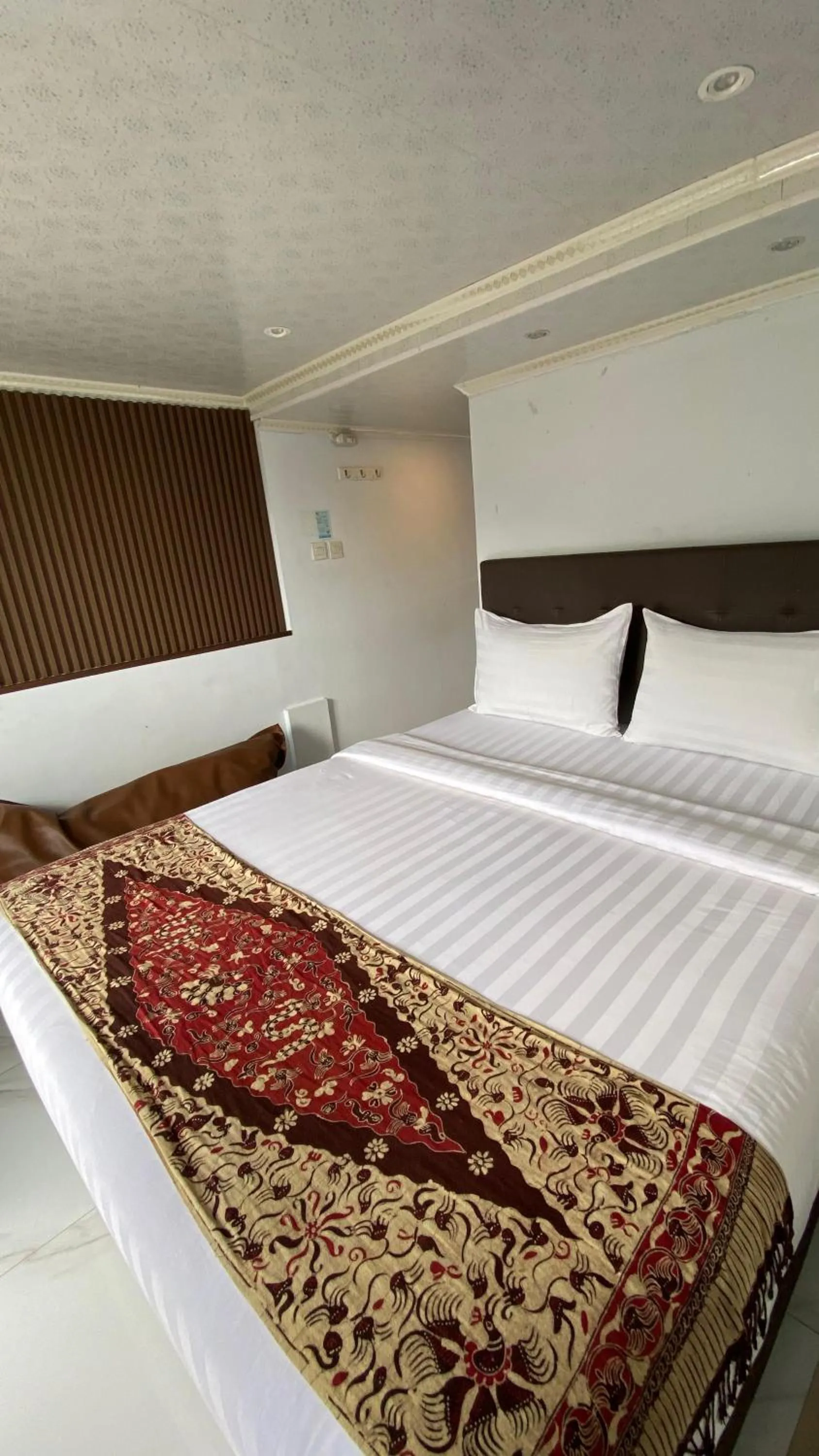 Bed in De Pointé Resort & Resto